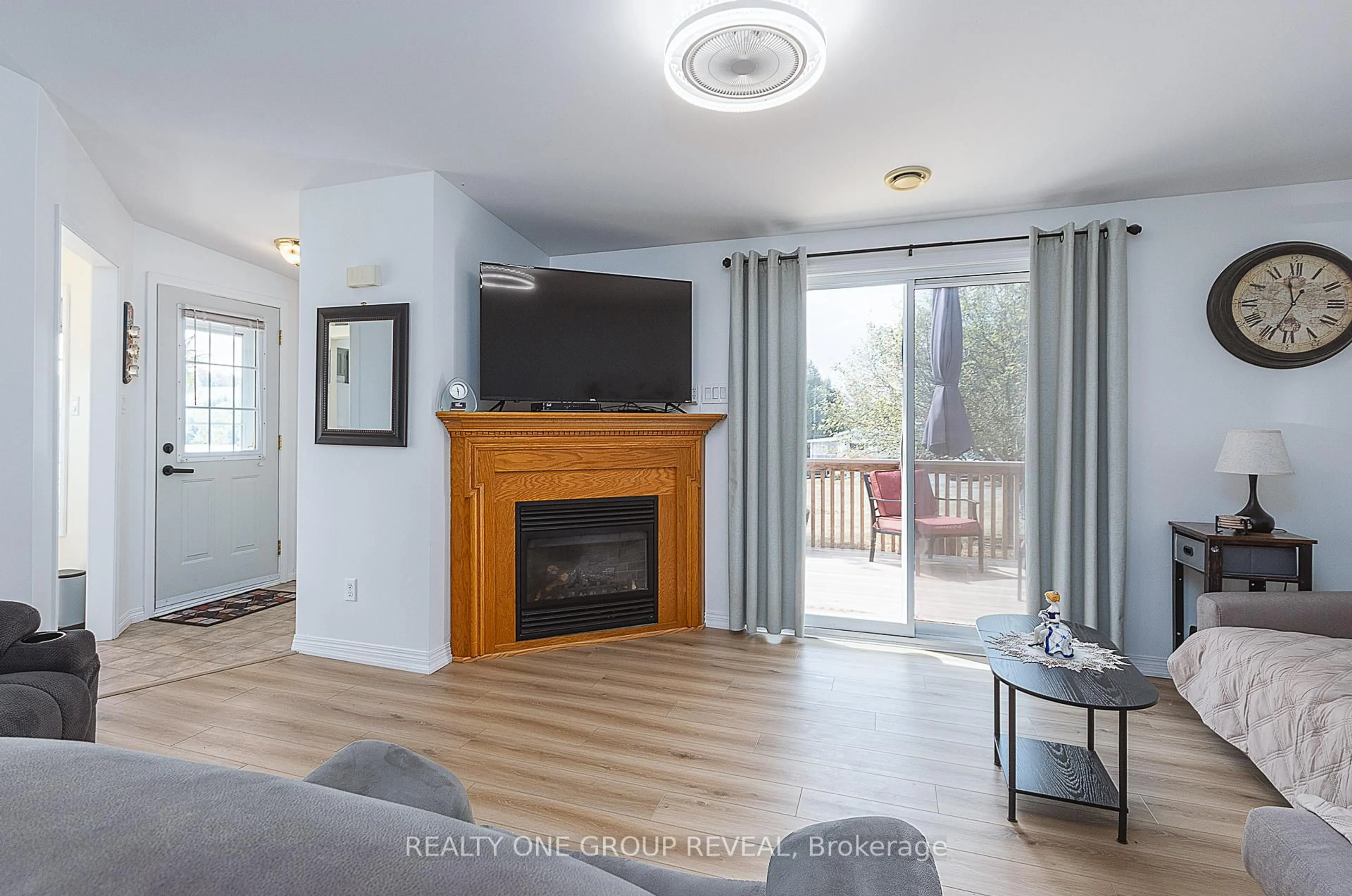 Living room with furniture, wood/laminate floor for 152 Concession Road 11 Rd #37, Trent Hills Ontario K0L 1Y0