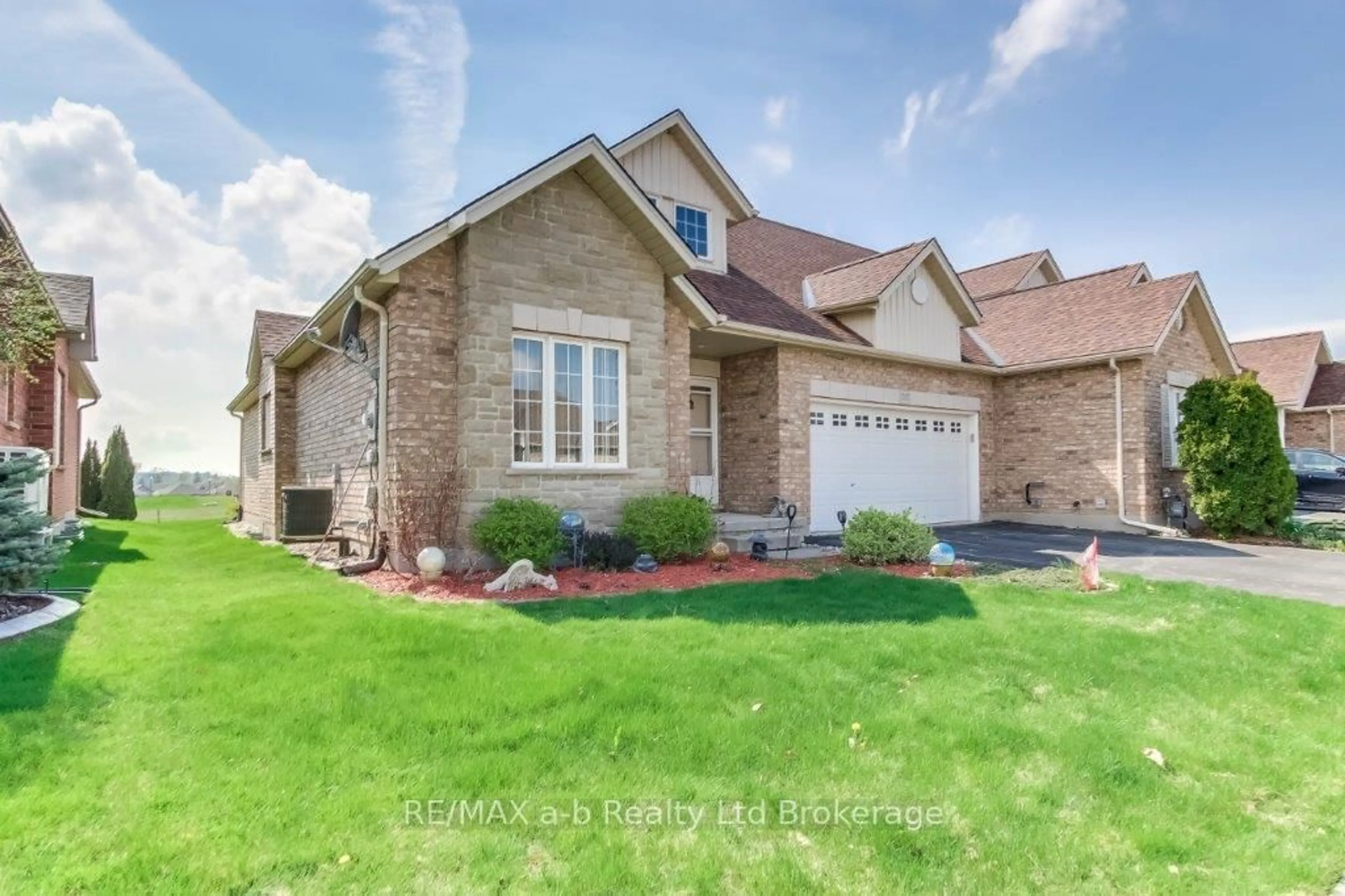 Home with brick exterior material, street for 717 Garden Court Cres, Woodstock Ontario N4T 0A2