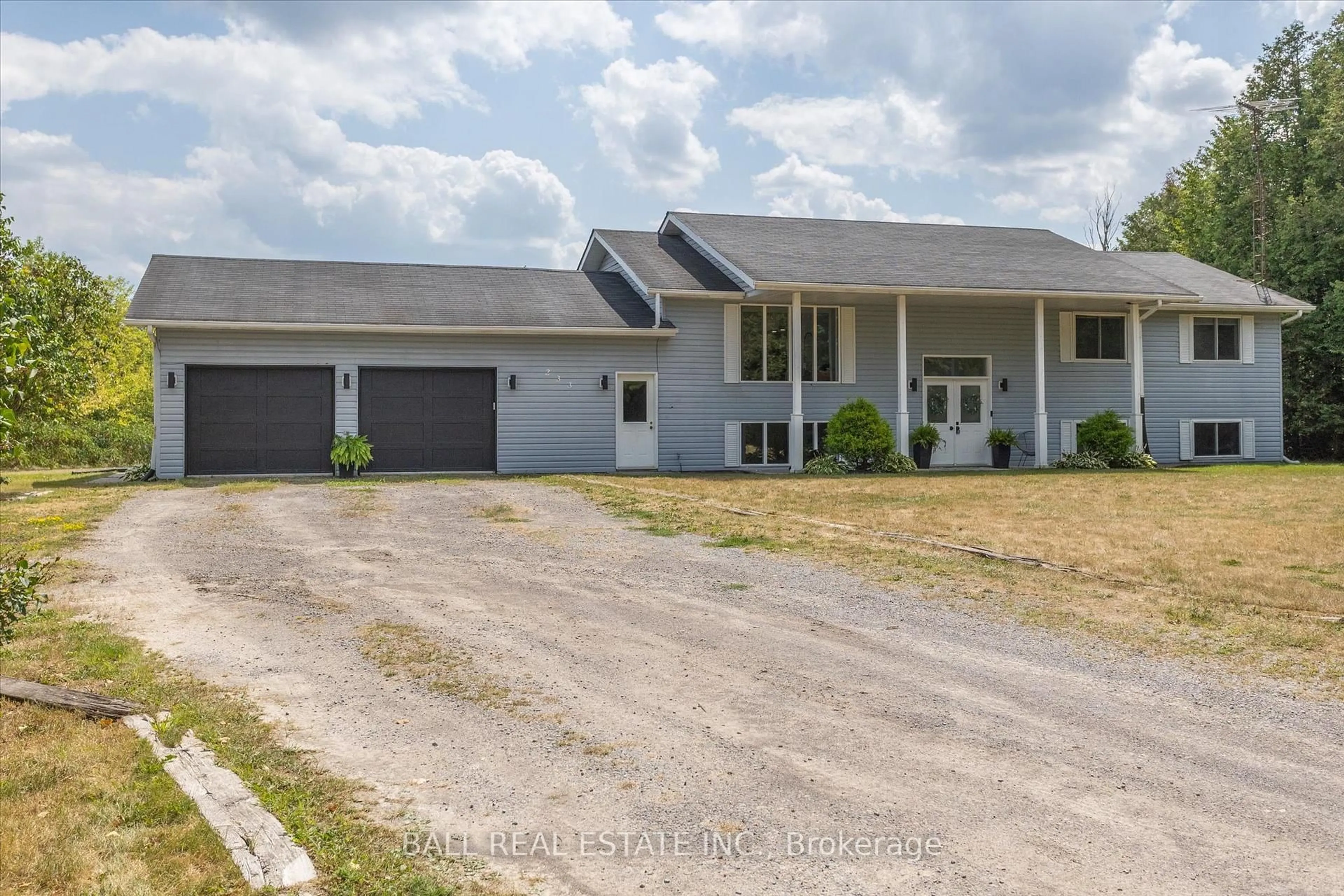 A pic from outside/outdoor area/front of a property/back of a property/a pic from drone, street for 233 Lonsberry Lane, Douro-Dummer Ontario K0L 3A0