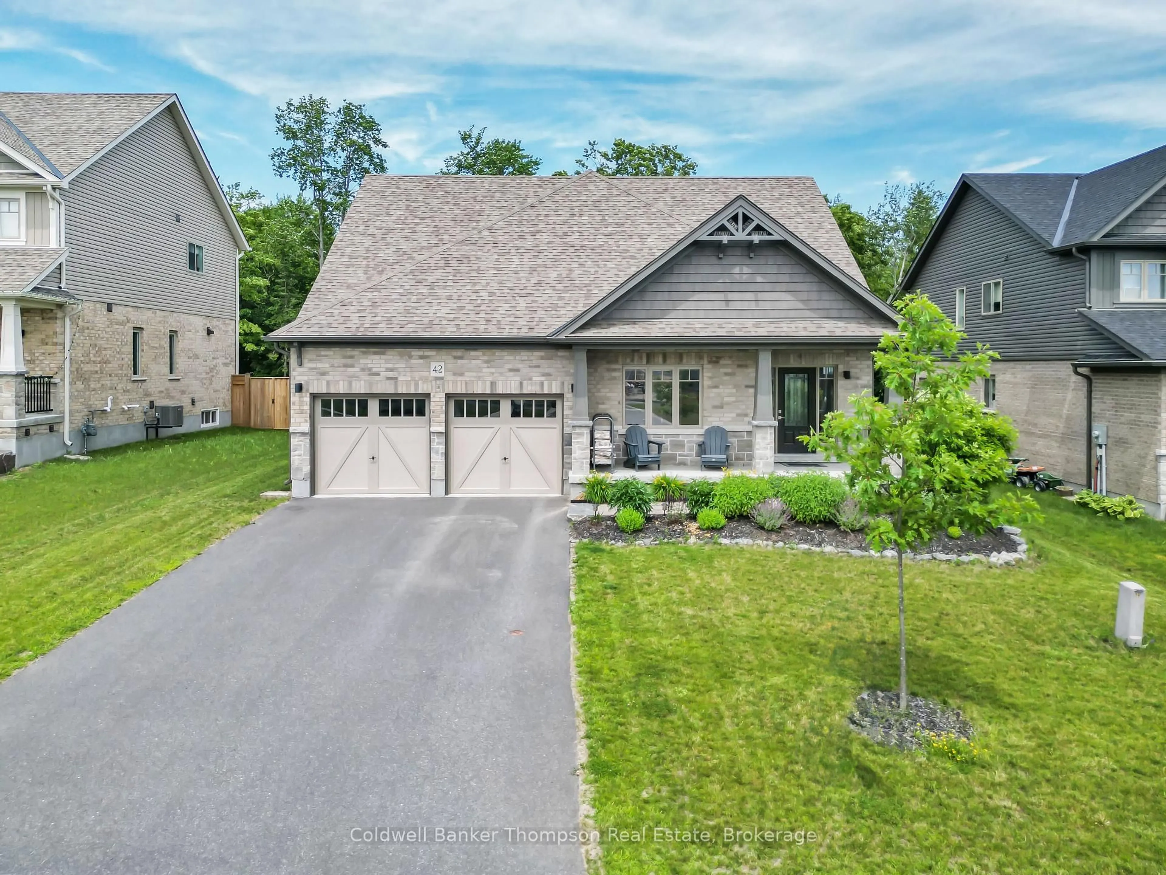 Home with brick exterior material, street for 42 Woodstream Dr, Huntsville Ontario P1H 0B7