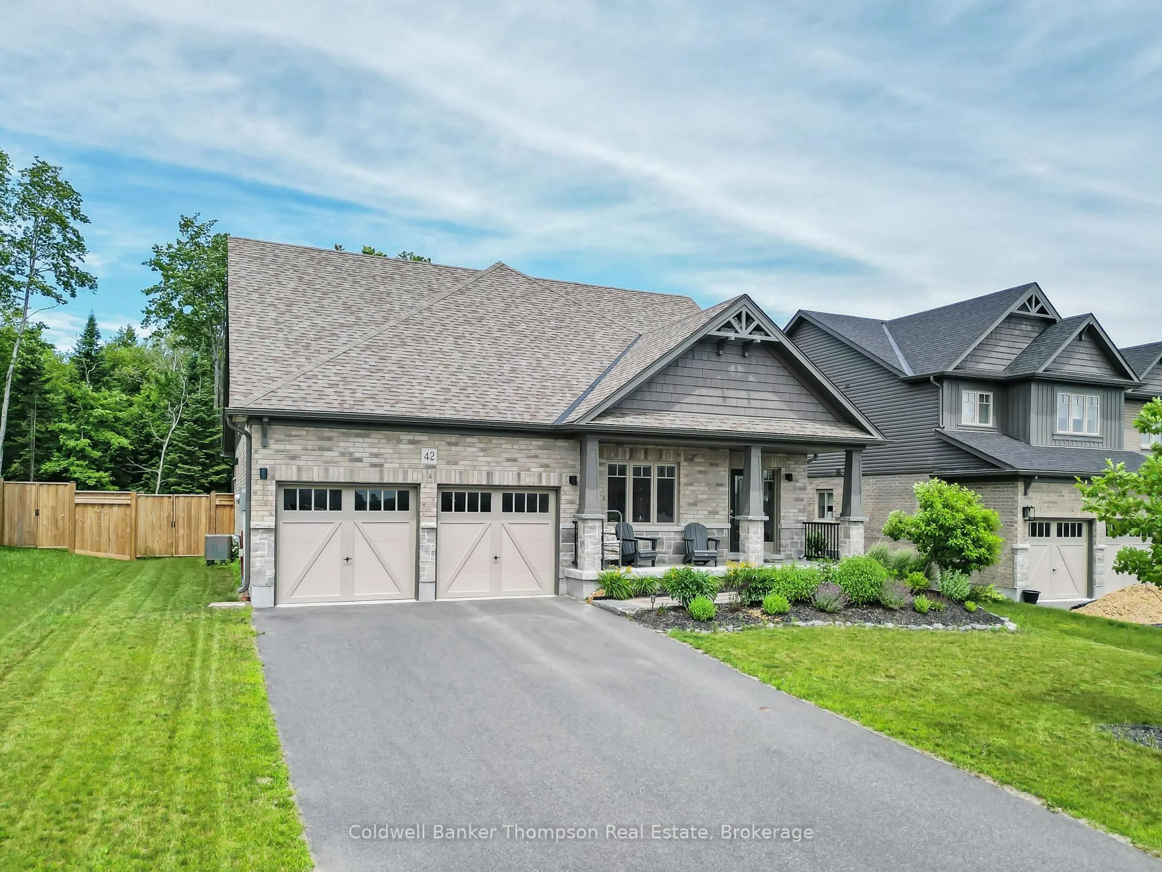 Home with brick exterior material, street for 42 Woodstream Dr, Huntsville Ontario P1H 0B7