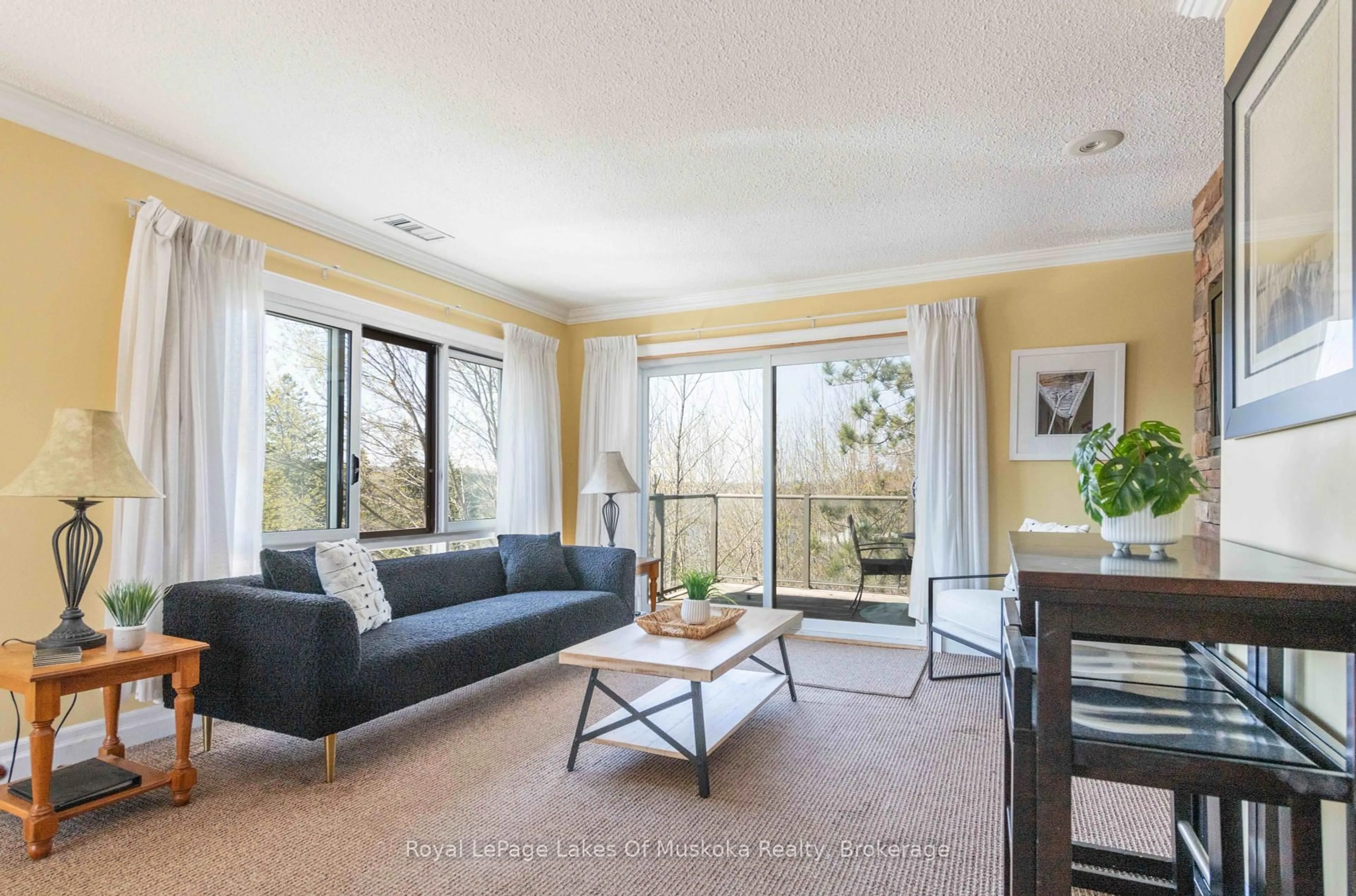 Living room with furniture, unknown for 29 Deerhurst Tennisview Dr #301, Huntsville Ontario P1H 1A9