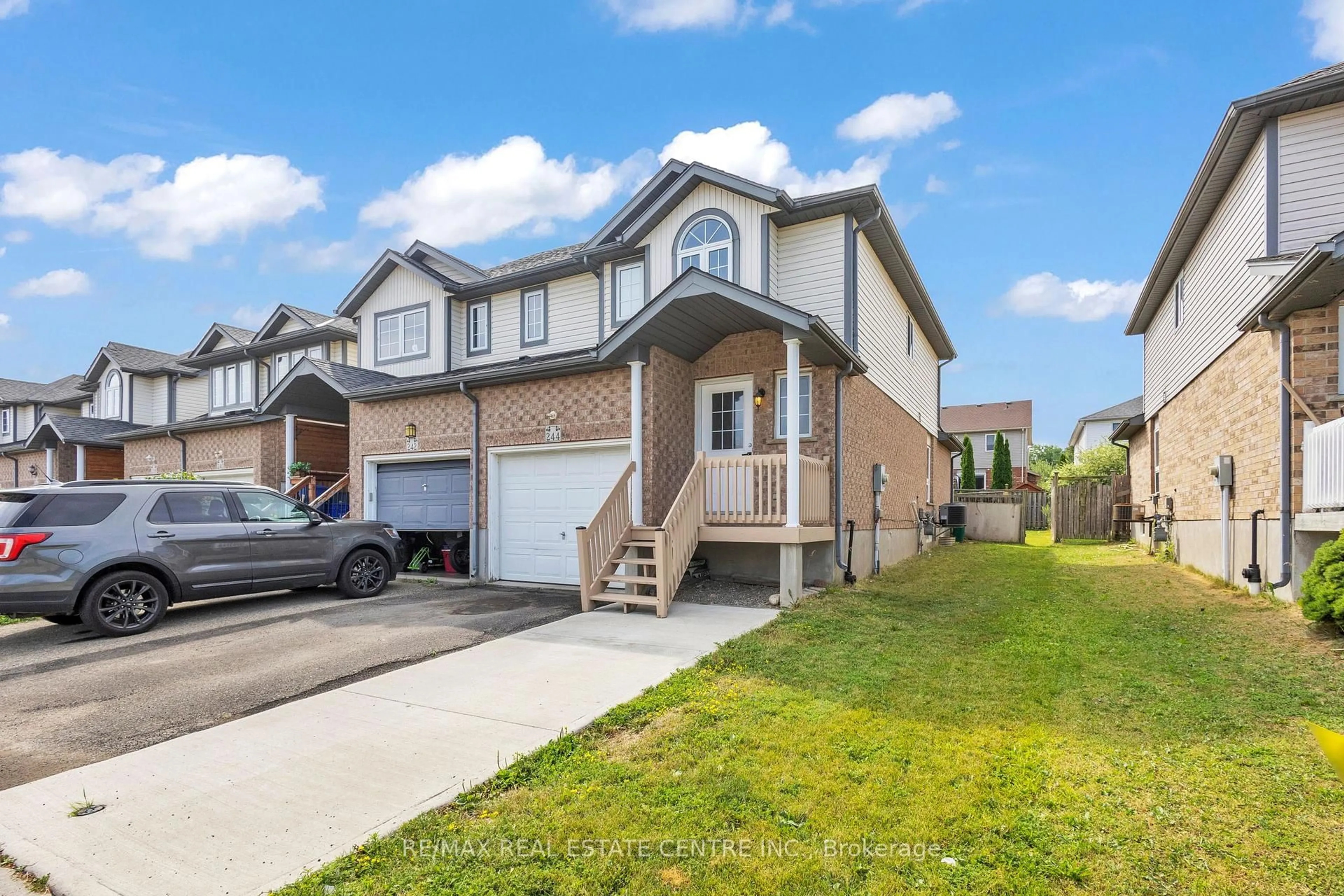 A pic from outside/outdoor area/front of a property/back of a property/a pic from drone, street for 244 Activa Ave, Kitchener Ontario N2E 3T9