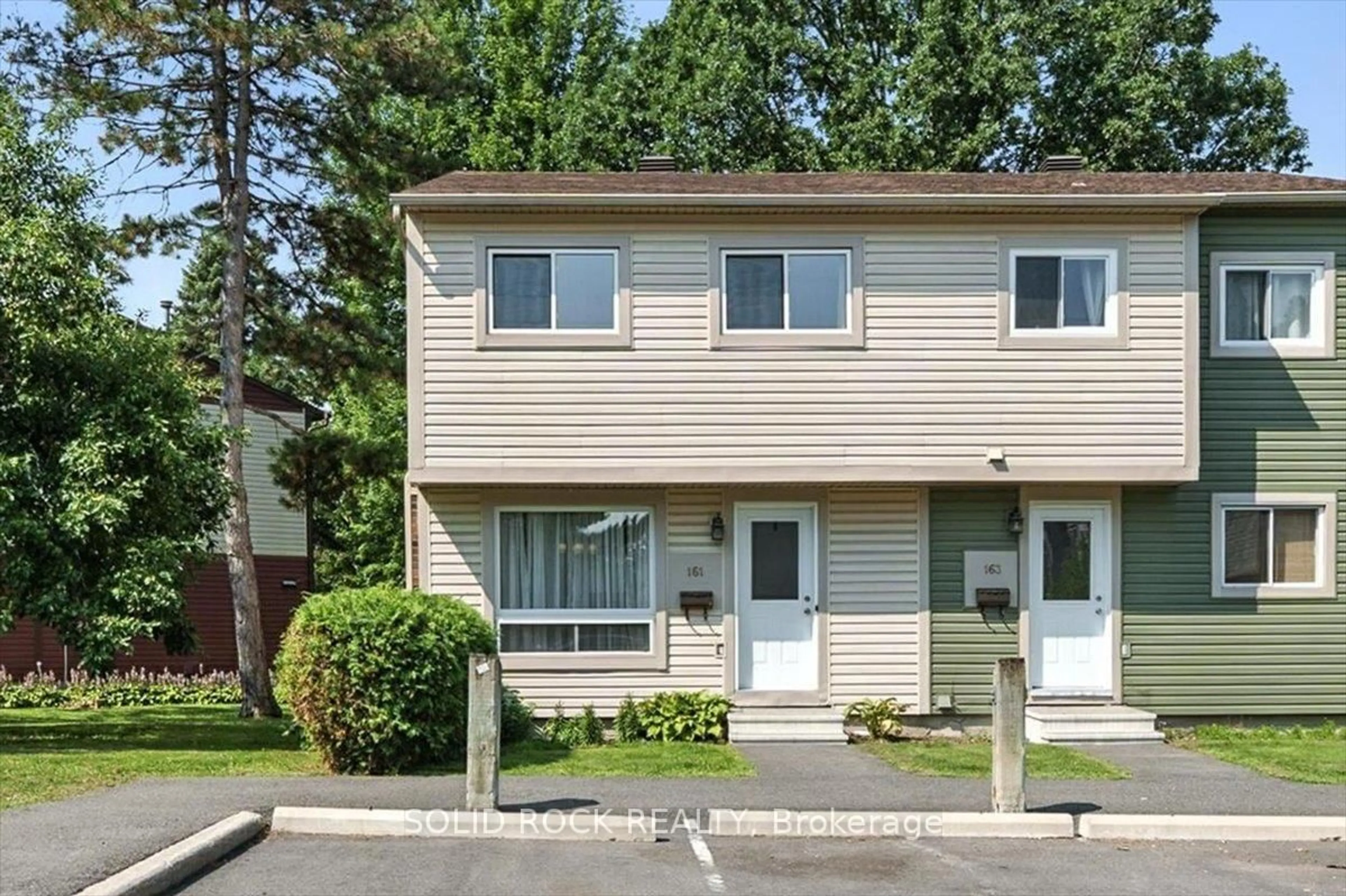 Home with vinyl exterior material, street for 161 Teal Cres, Orleans Ontario K1E 2C1