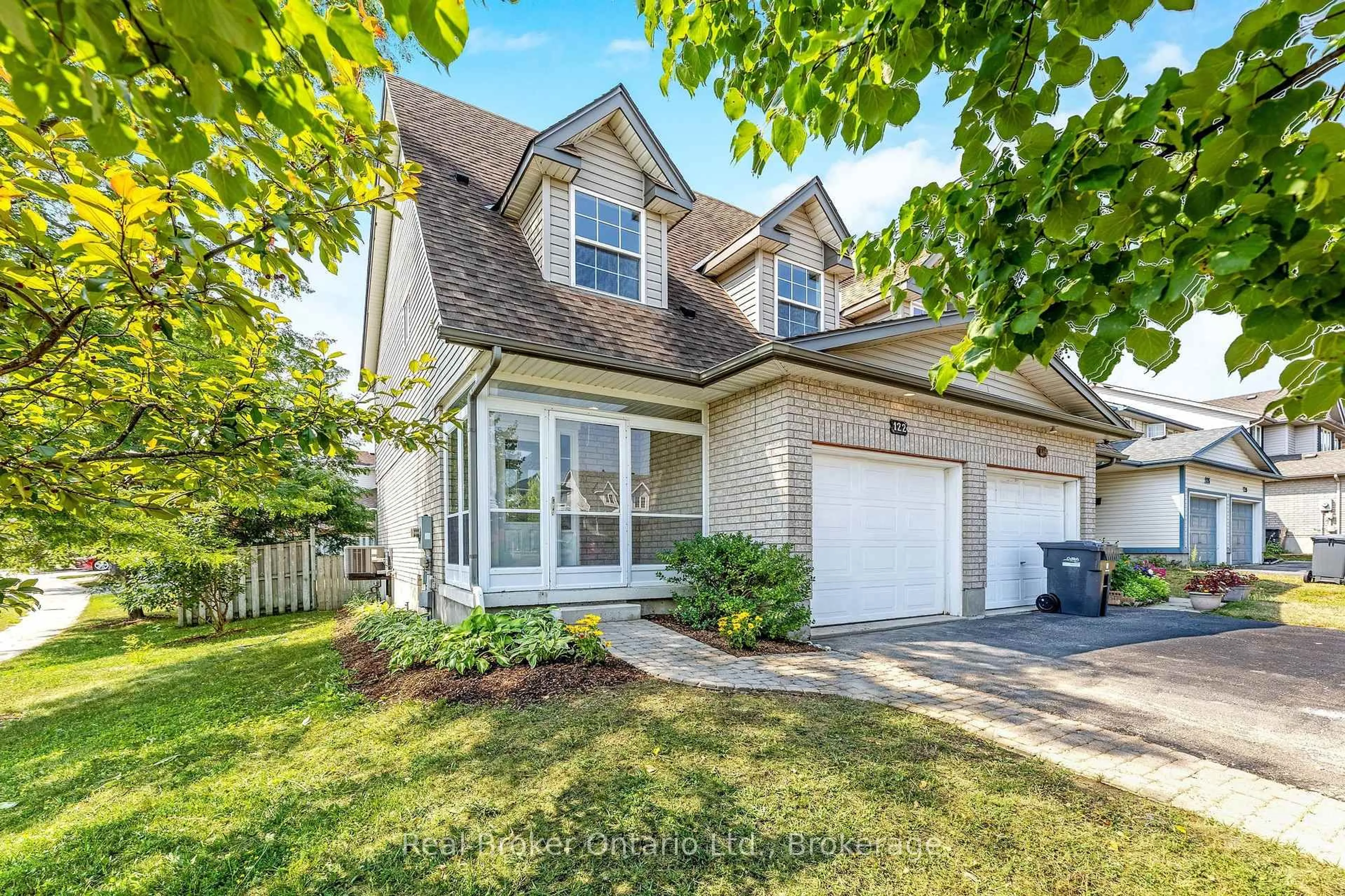 Home with vinyl exterior material, street for 122 Silurian Dr, Guelph Ontario N1E 7G1
