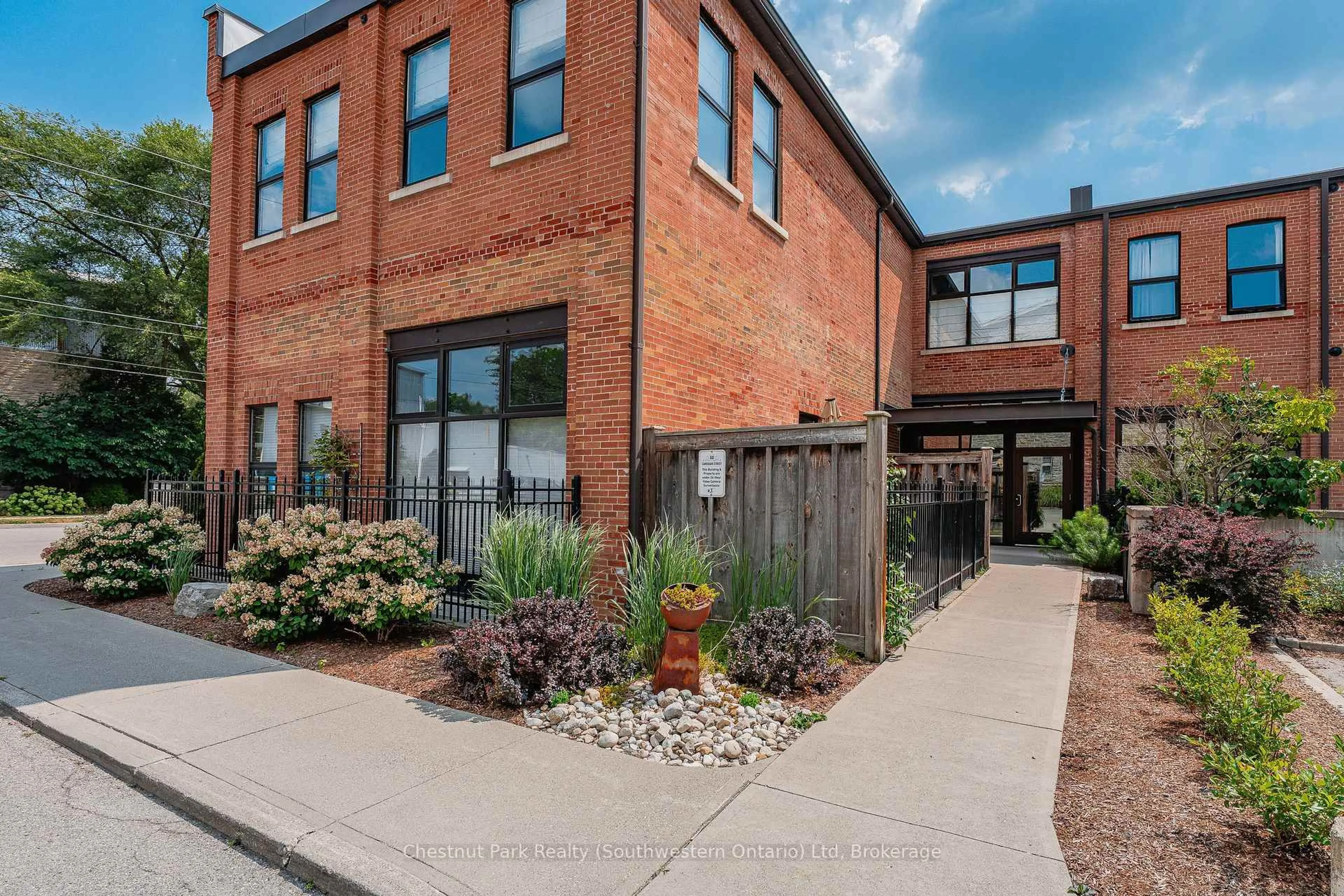 Home with brick exterior material, street for 60 Cardigan St #106, Guelph Ontario N1H 3Z6