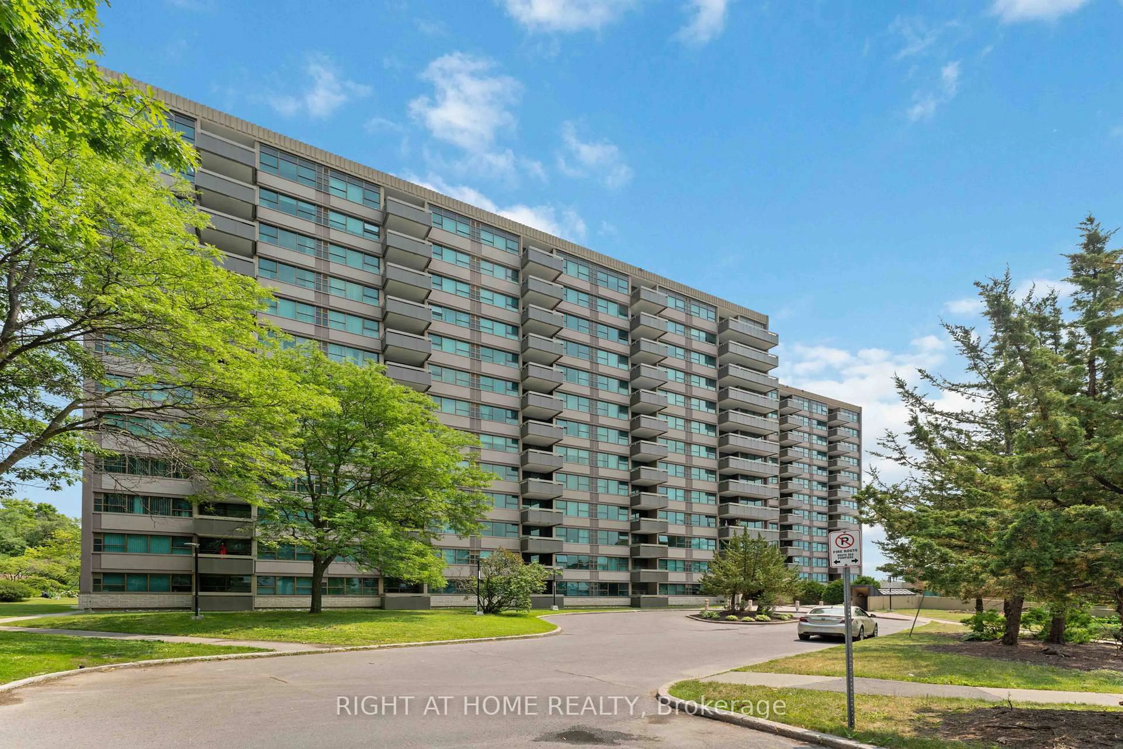 A pic from outside/outdoor area/front of a property/back of a property/a pic from drone, unknown for 555 Brittany Dr #302, Ottawa Ontario K1K 4C5