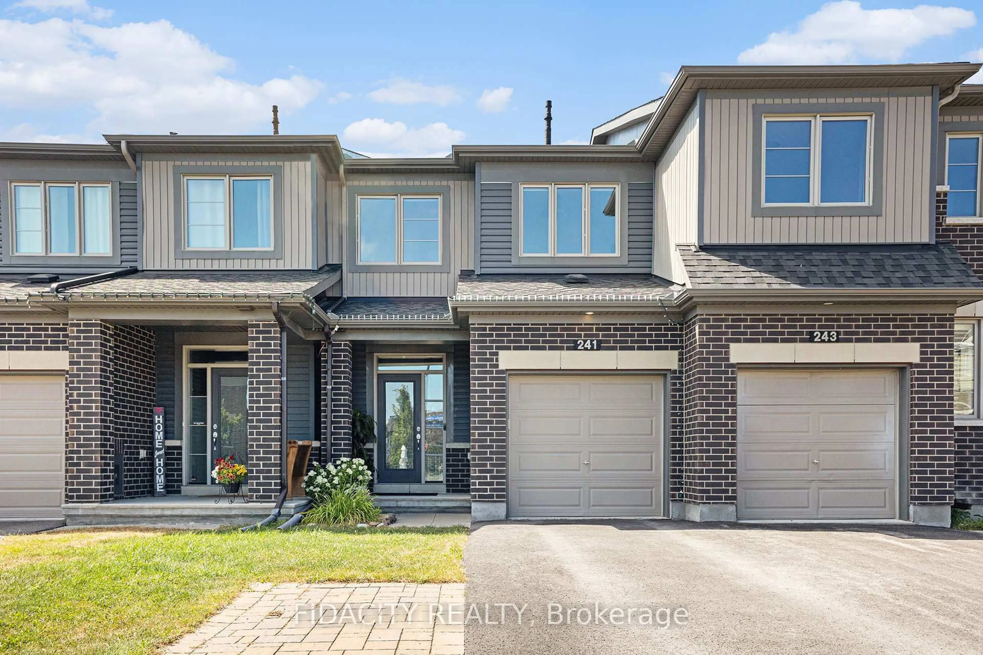 Home with brick exterior material, street for 241 Bandelier Way, Stittsville Ontario K2S 2J3