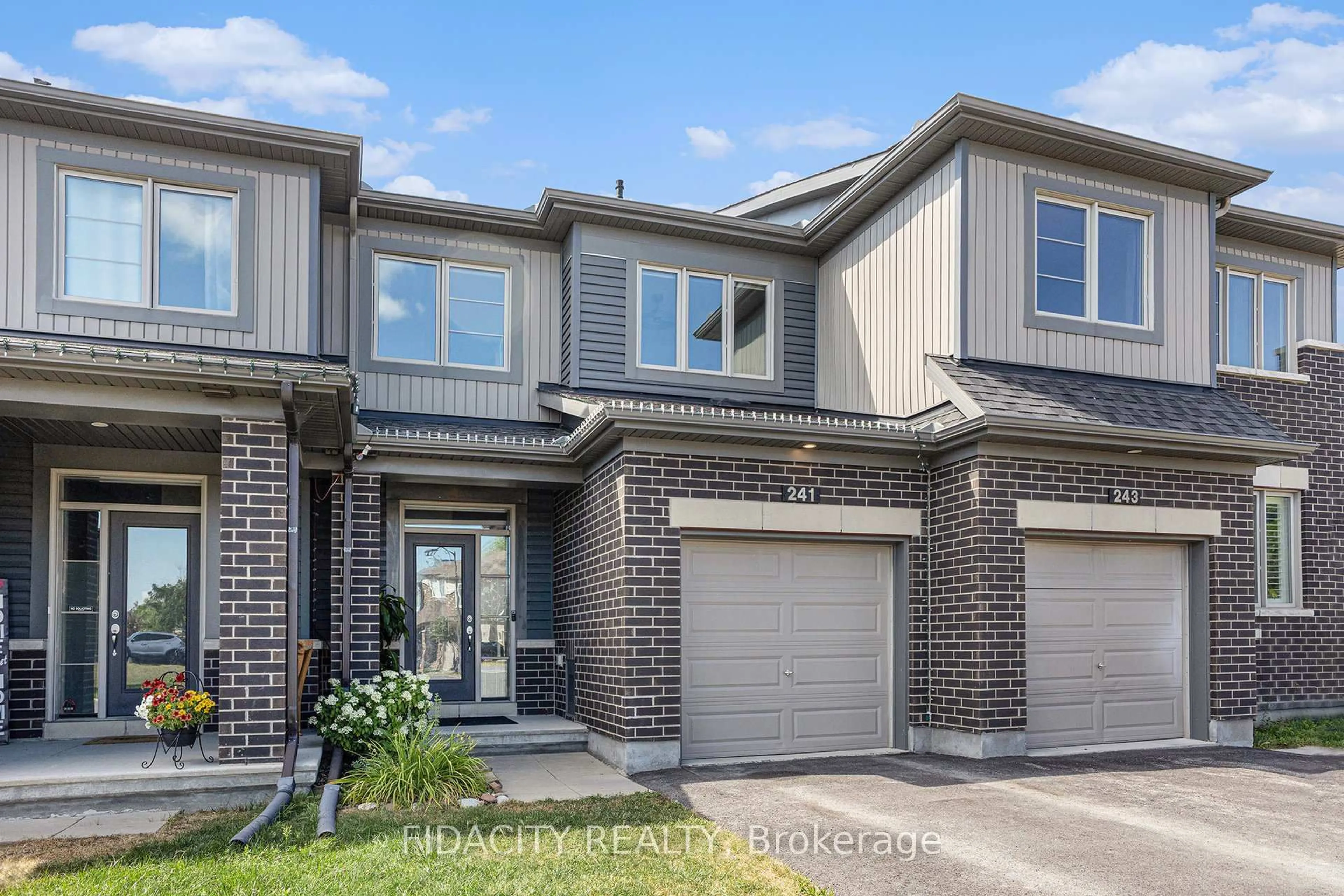 Home with brick exterior material, street for 241 Bandelier Way, Stittsville Ontario K2S 2J3