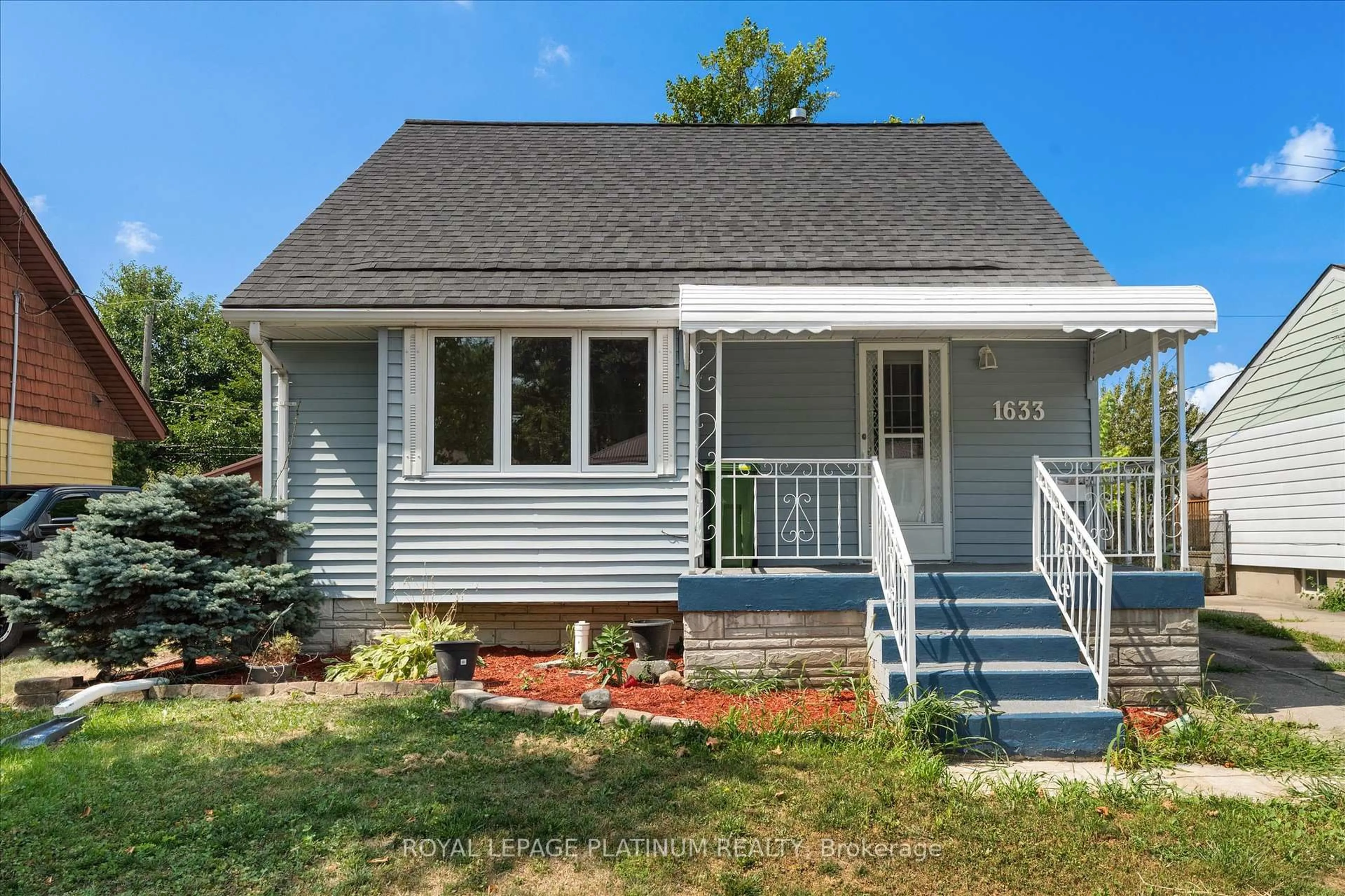 Home with vinyl exterior material, street for 1633 Norman Rd, Windsor Ontario N8Y 4N6