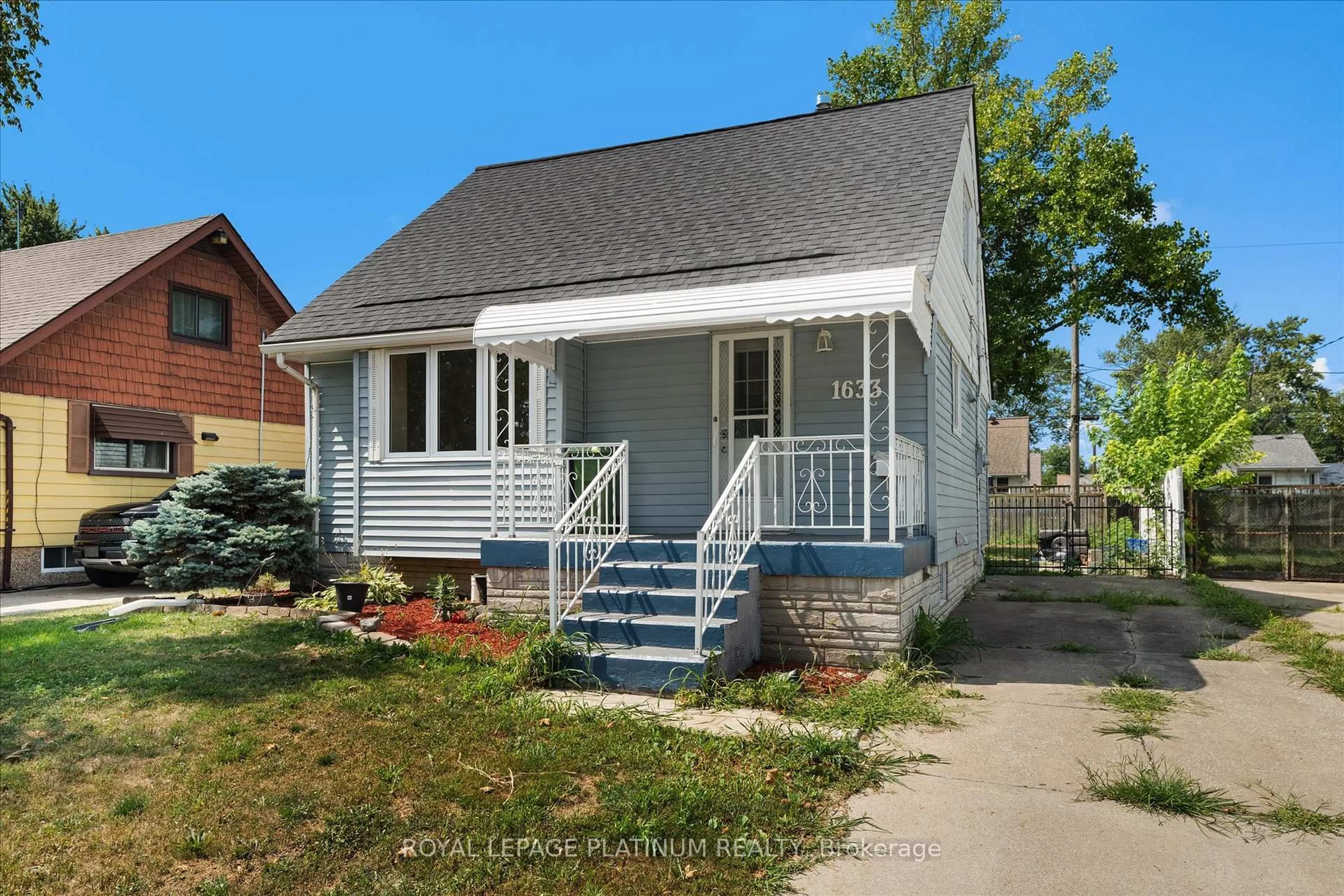 Home with vinyl exterior material, street for 1633 Norman Rd, Windsor Ontario N8Y 4N6