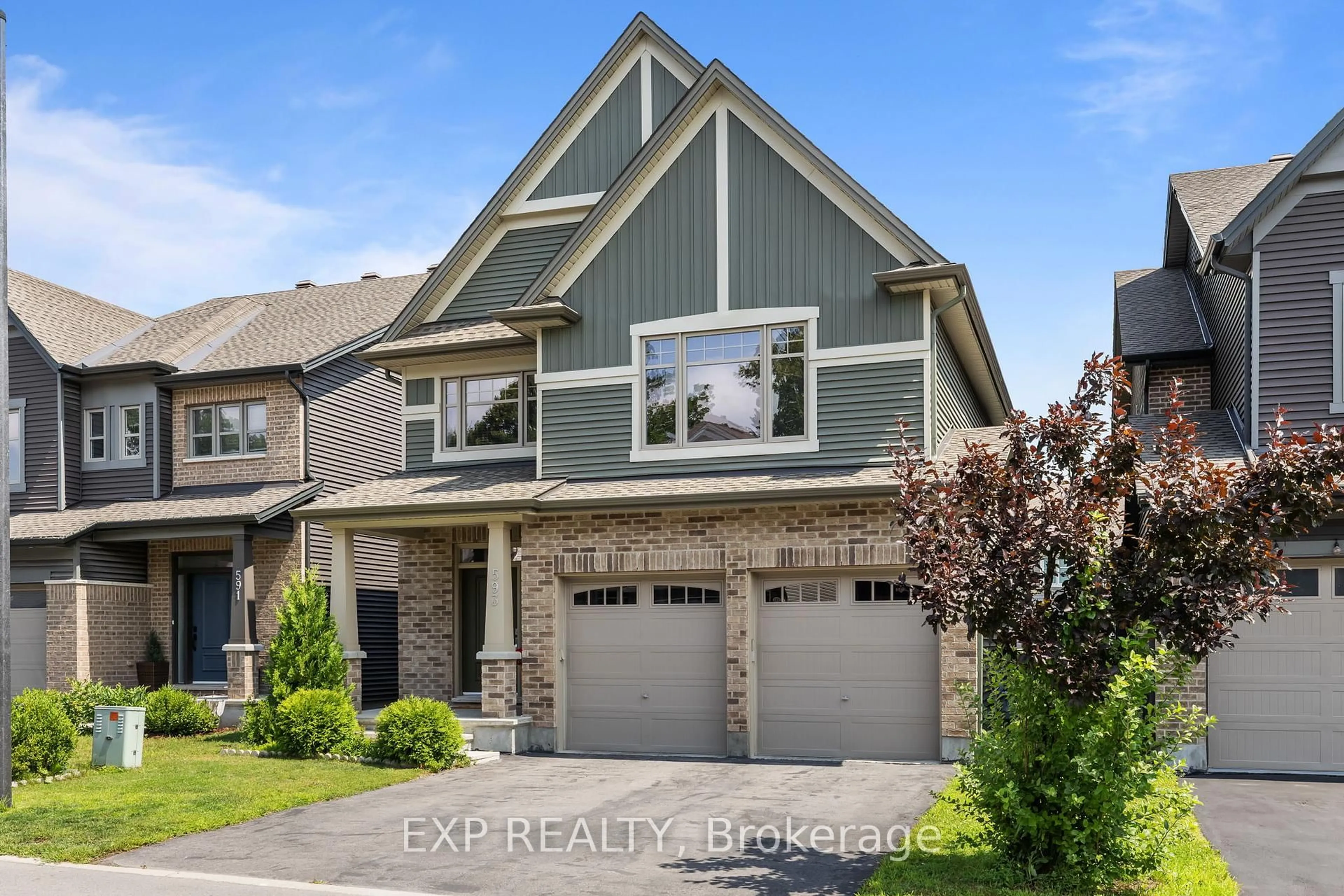 Home with brick exterior material, street for 593 Vivera Pl, Ottawa Ontario K2S 2M9