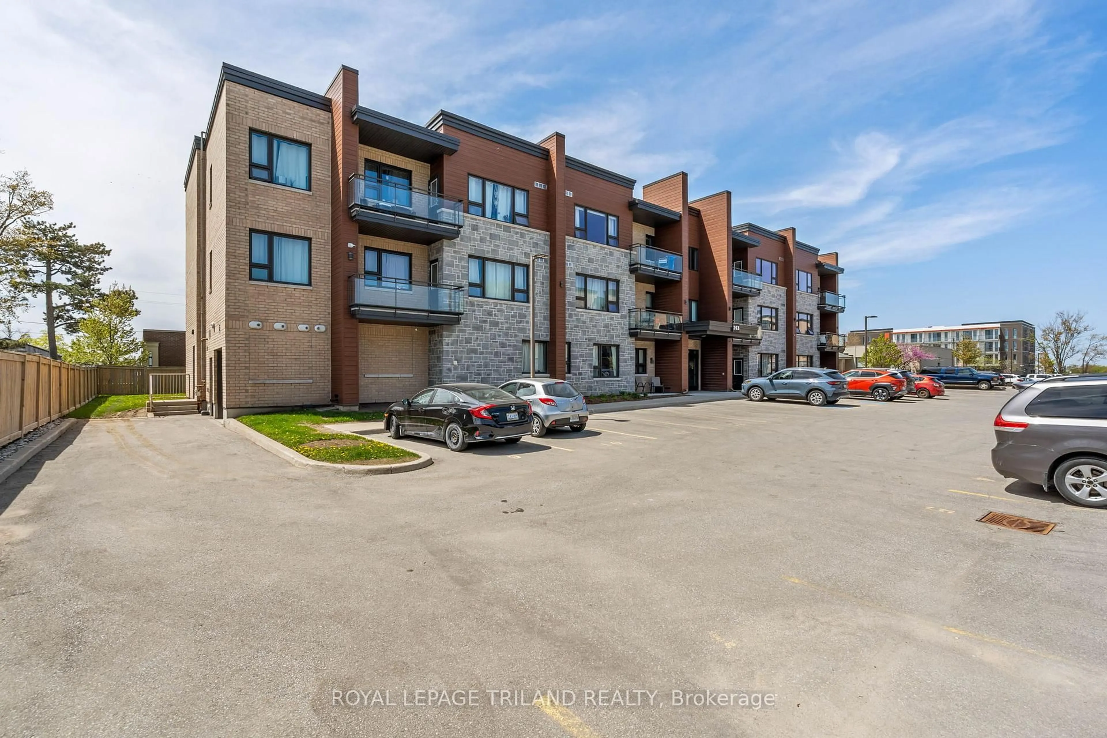 A pic from outside/outdoor area/front of a property/back of a property/a pic from drone, unknown for 263 Butler St #305, Lucan Biddulph Ontario N0M 2J0
