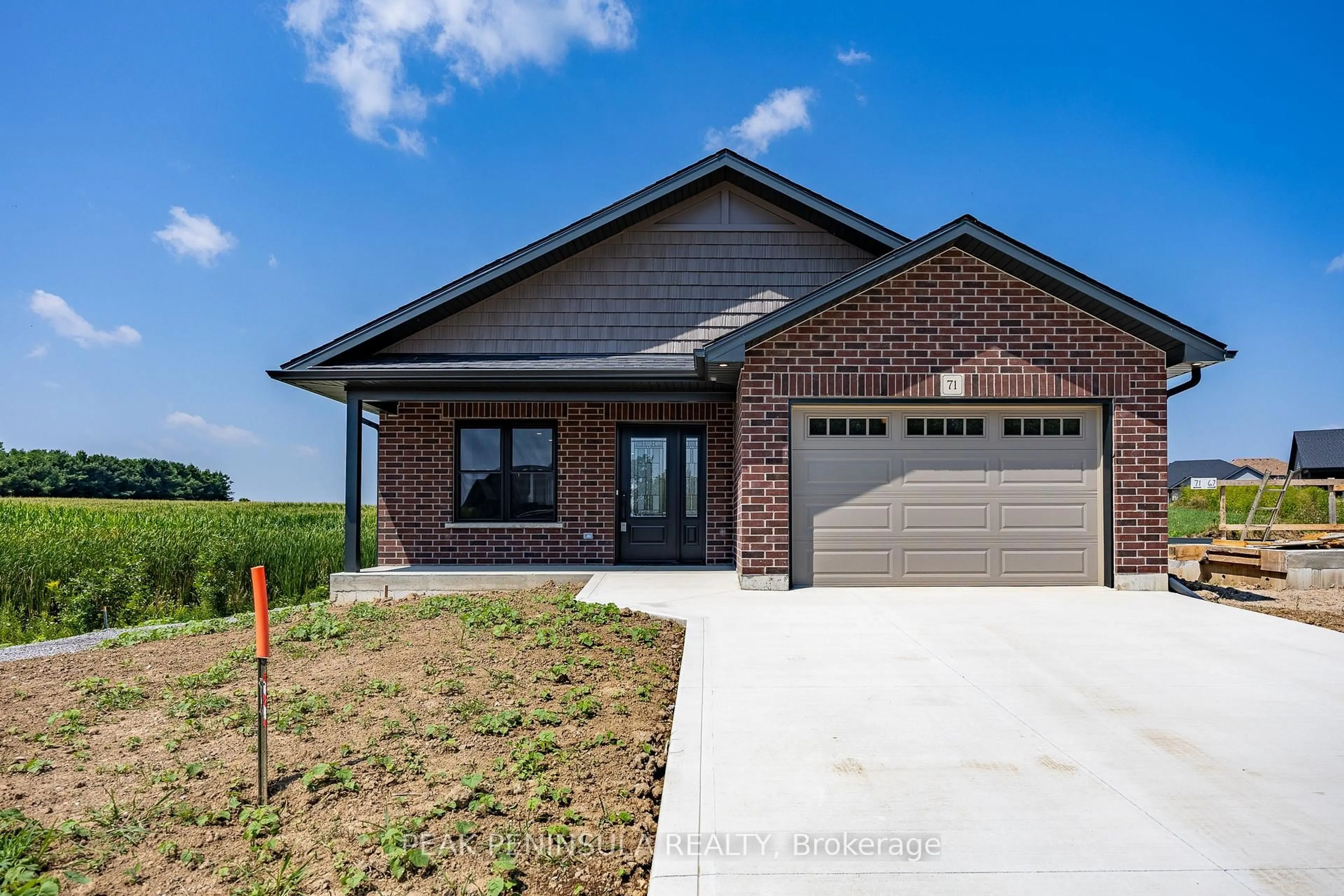 Home with brick exterior material, street for 71 Hunter Dr, Norfolk Ontario N0E 1M0