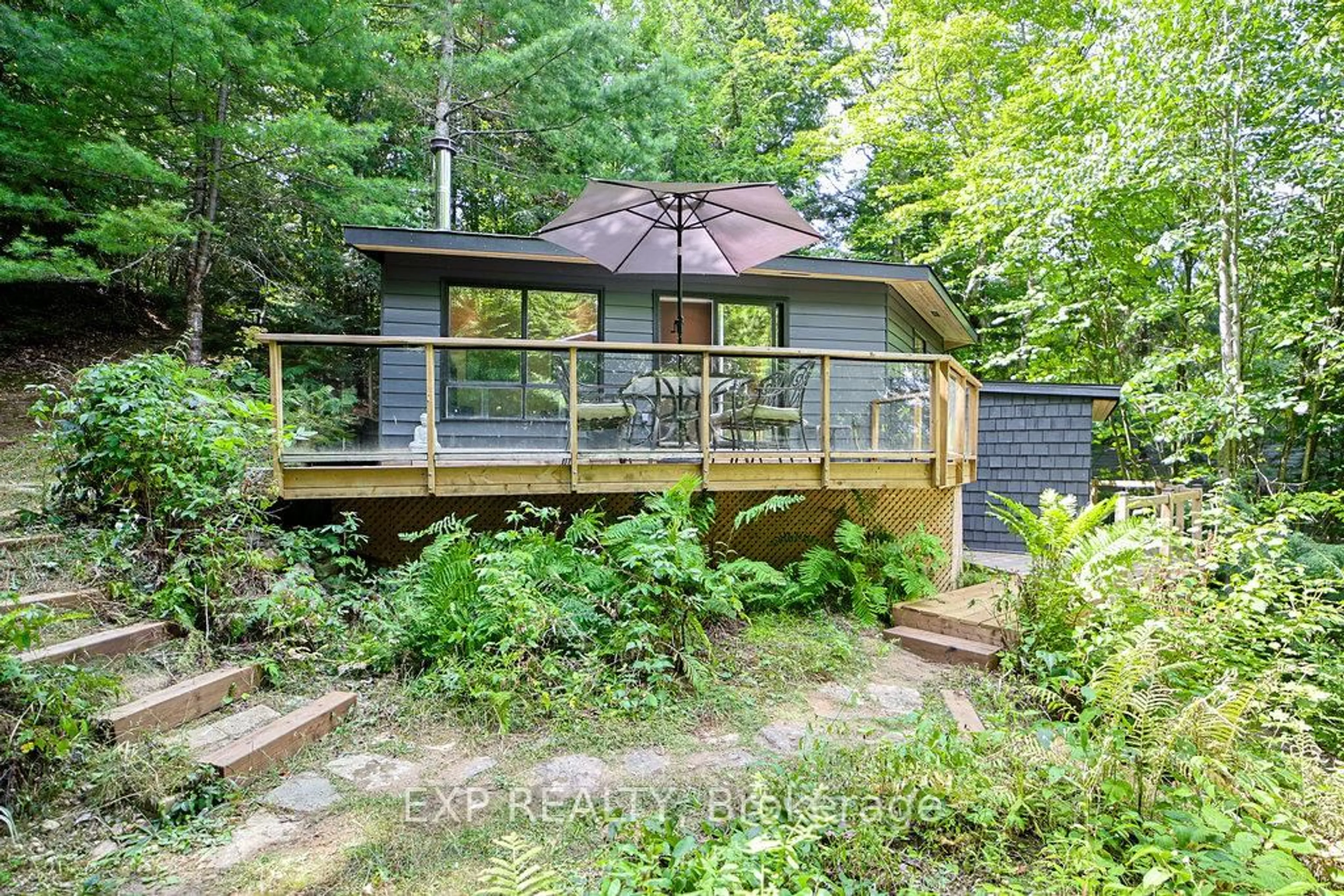 Patio, forest/trees view for 565 West Diamond Lake Rd, Haliburton Ontario K0L 2A0