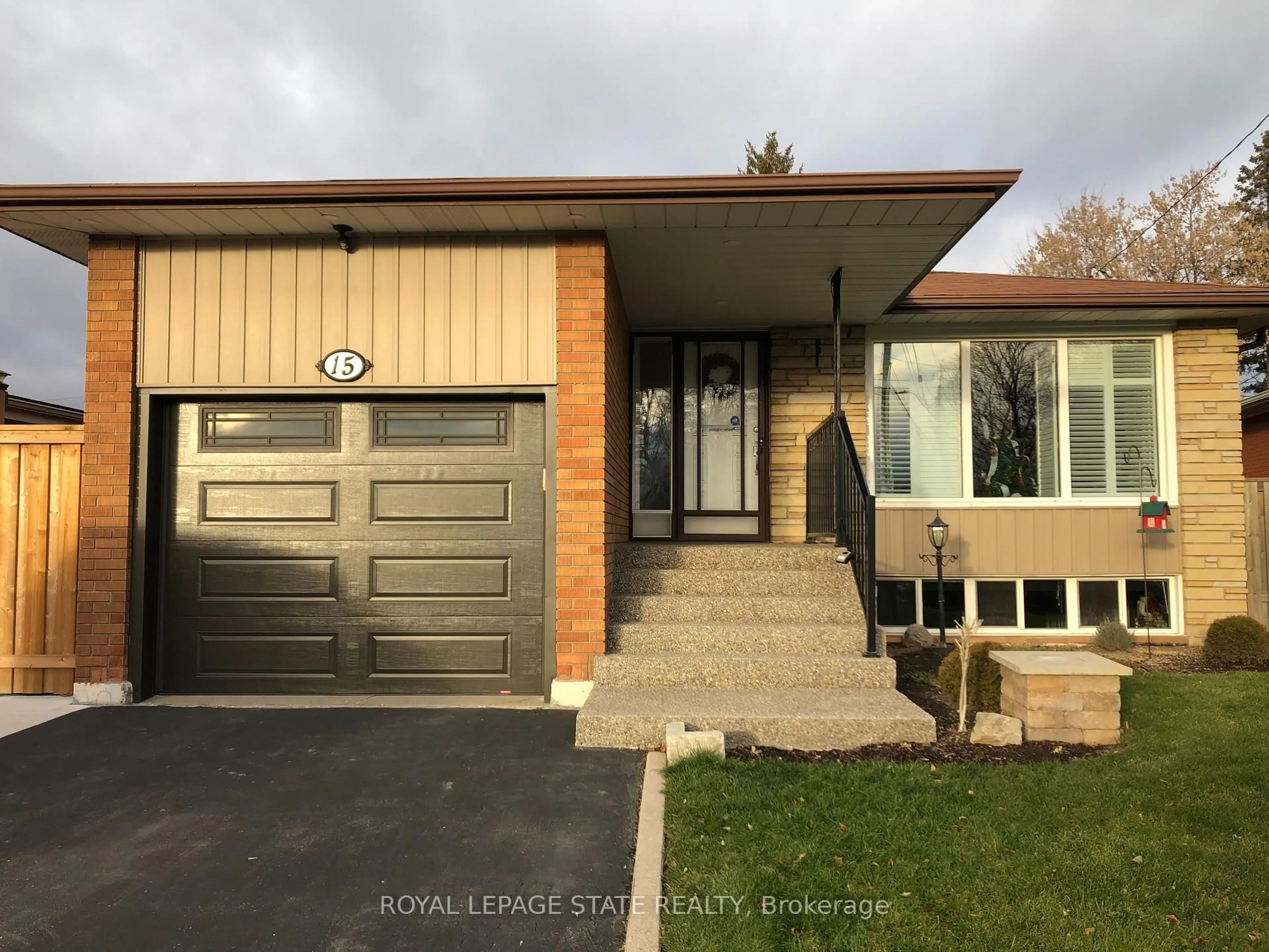 Home with vinyl exterior material, street for 15 Purdy Cres, Hamilton Ontario L9A 3B4