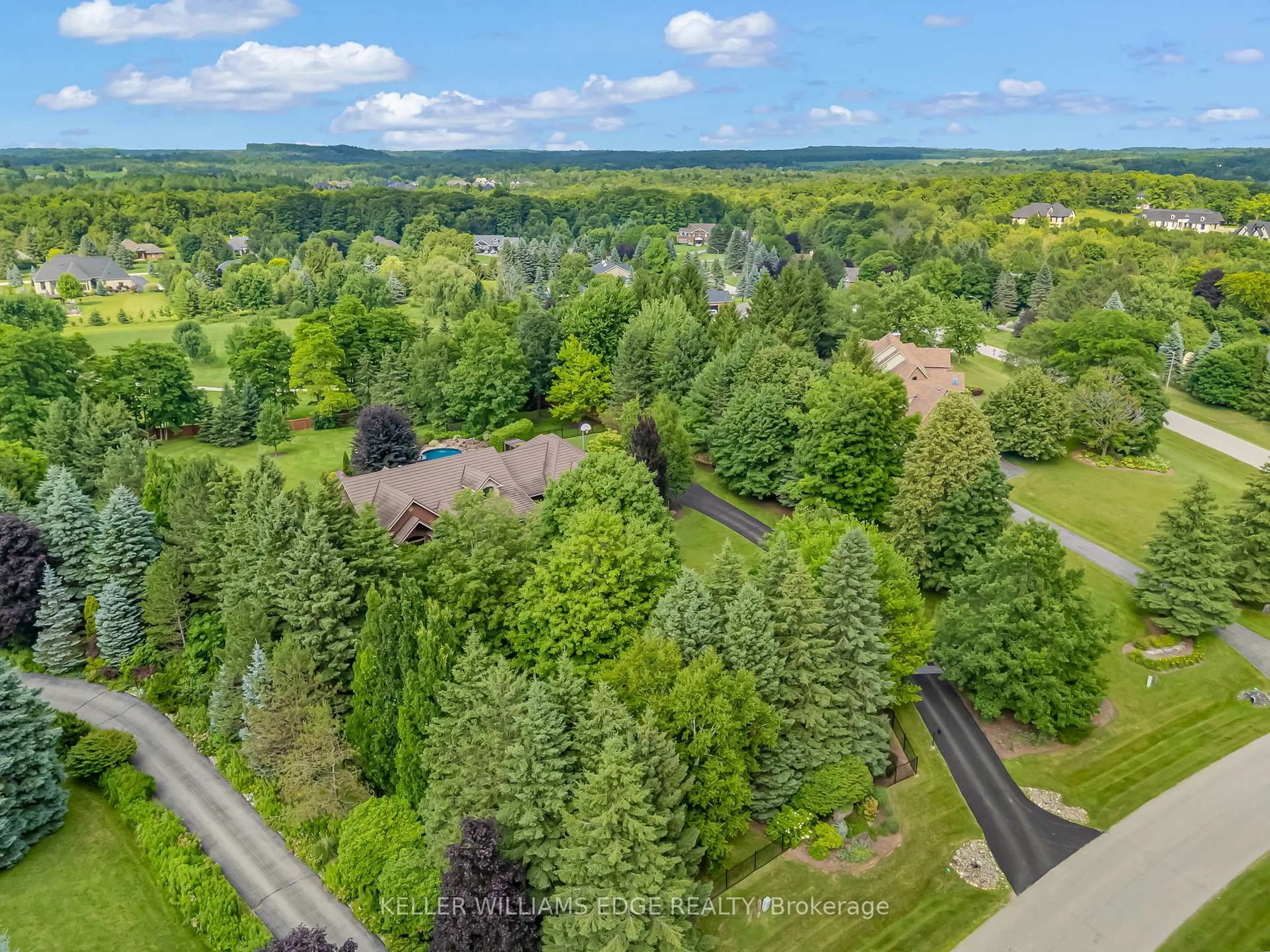 A pic from outside/outdoor area/front of a property/back of a property/a pic from drone, forest/trees view for 18 Fox Run Dr, Puslinch Ontario N0B 2J0