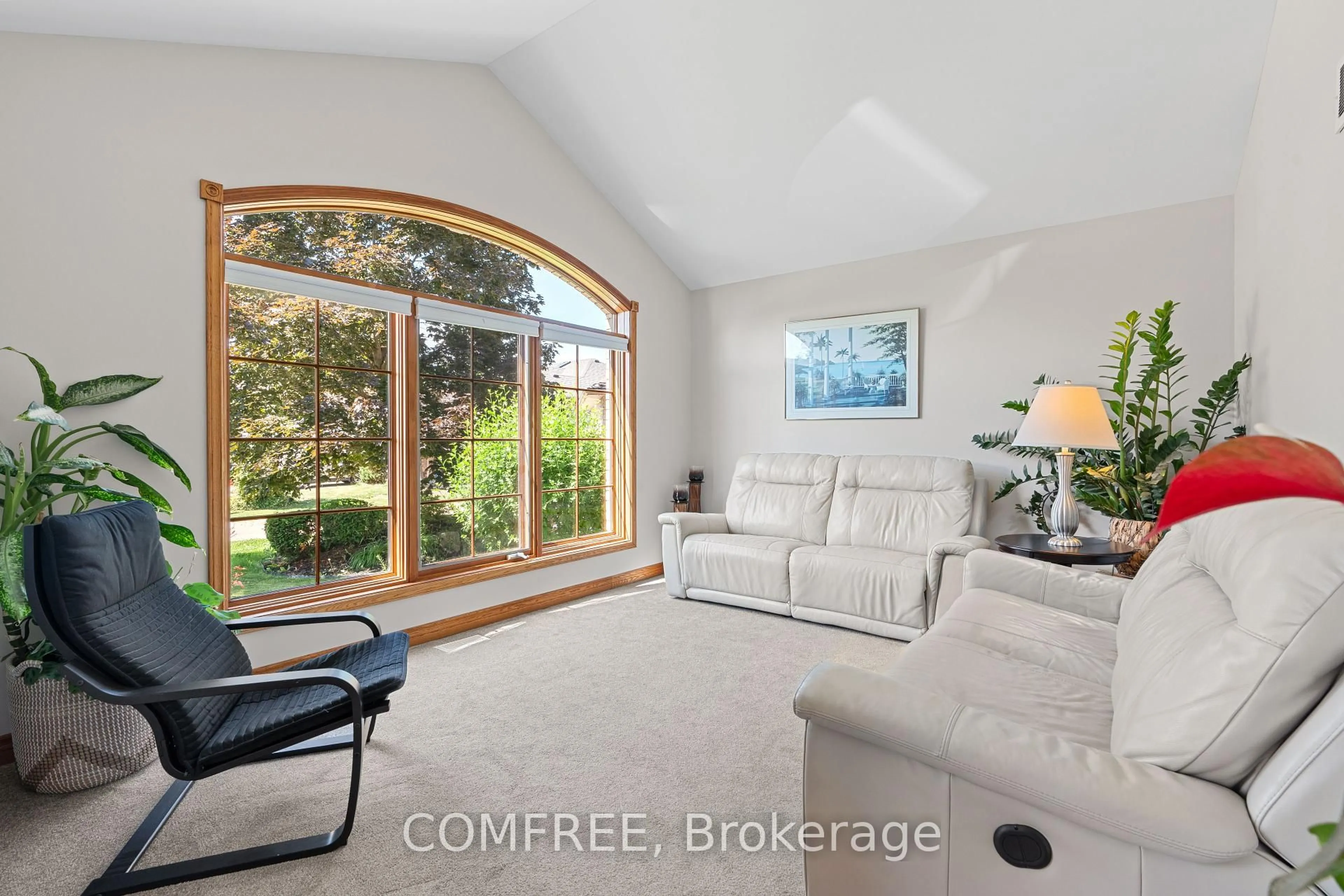 Living room with furniture, ceramic/tile floor for 4168 Dimambro Crt, Windsor Ontario N9G 2V2