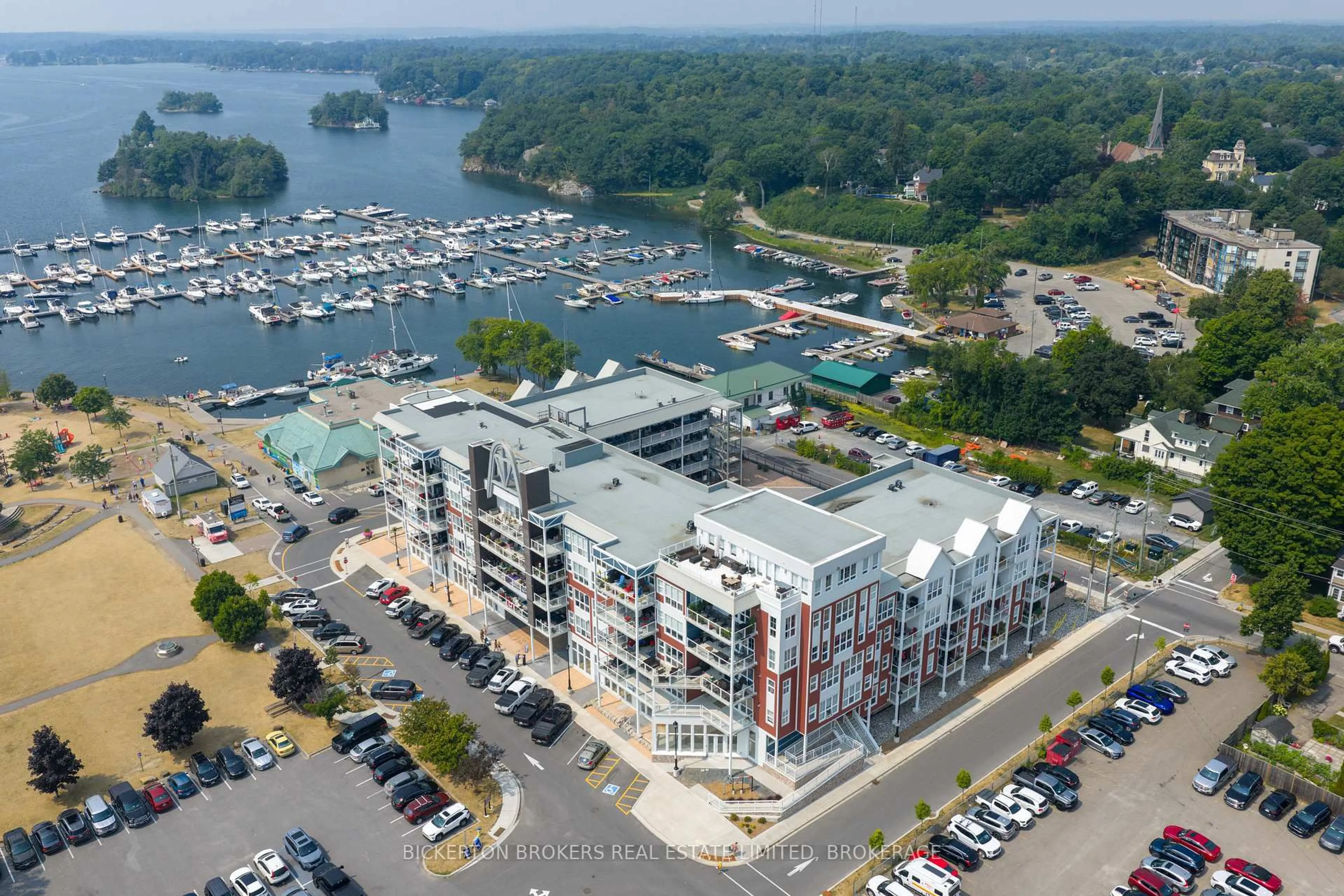 A pic from outside/outdoor area/front of a property/back of a property/a pic from drone, water/lake/river/ocean view for 130 Water St #406, Gananoque Ontario K7G 0A8