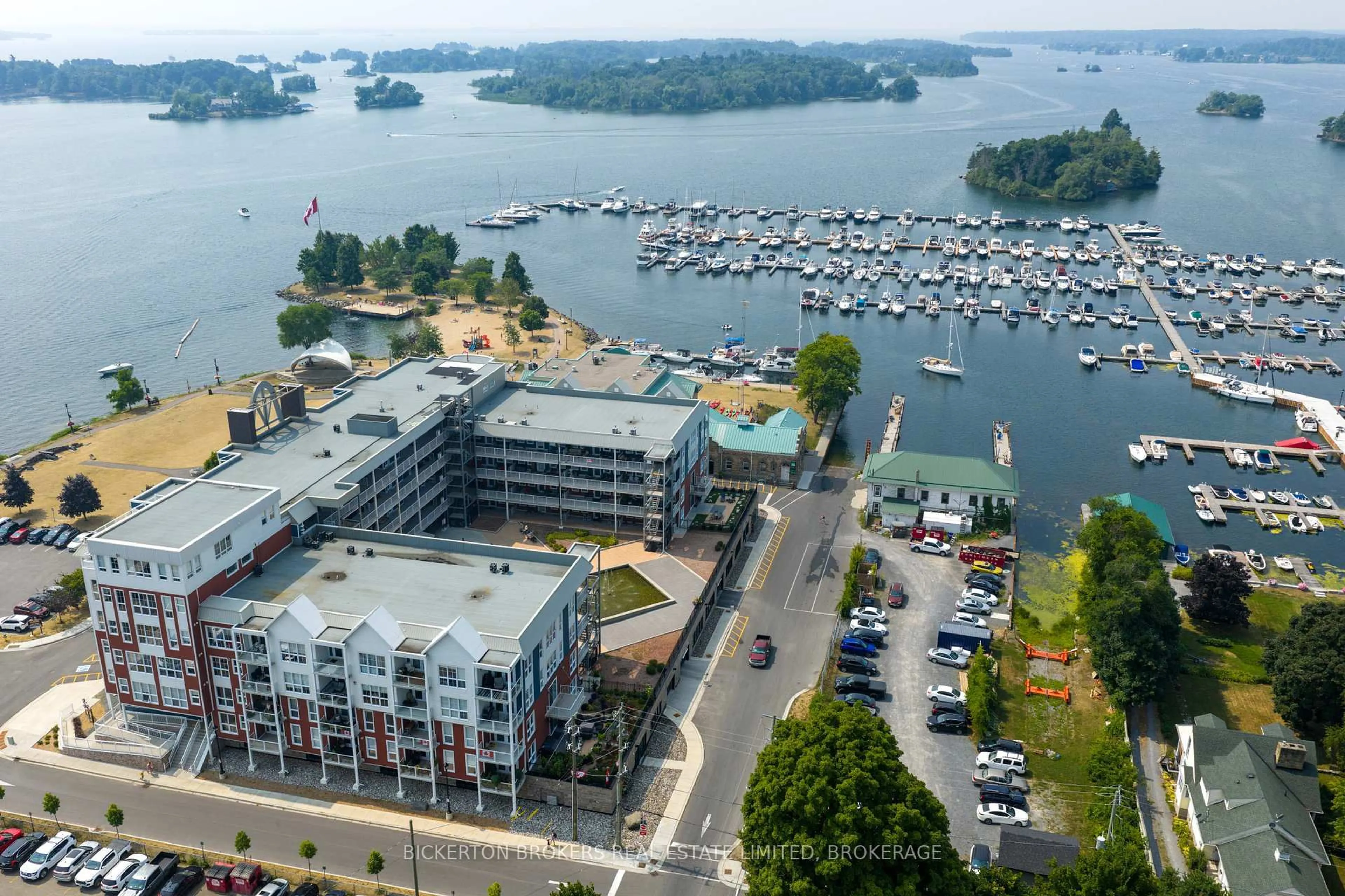 A pic from outside/outdoor area/front of a property/back of a property/a pic from drone, water/lake/river/ocean view for 130 Water St #406, Gananoque Ontario K7G 0A8