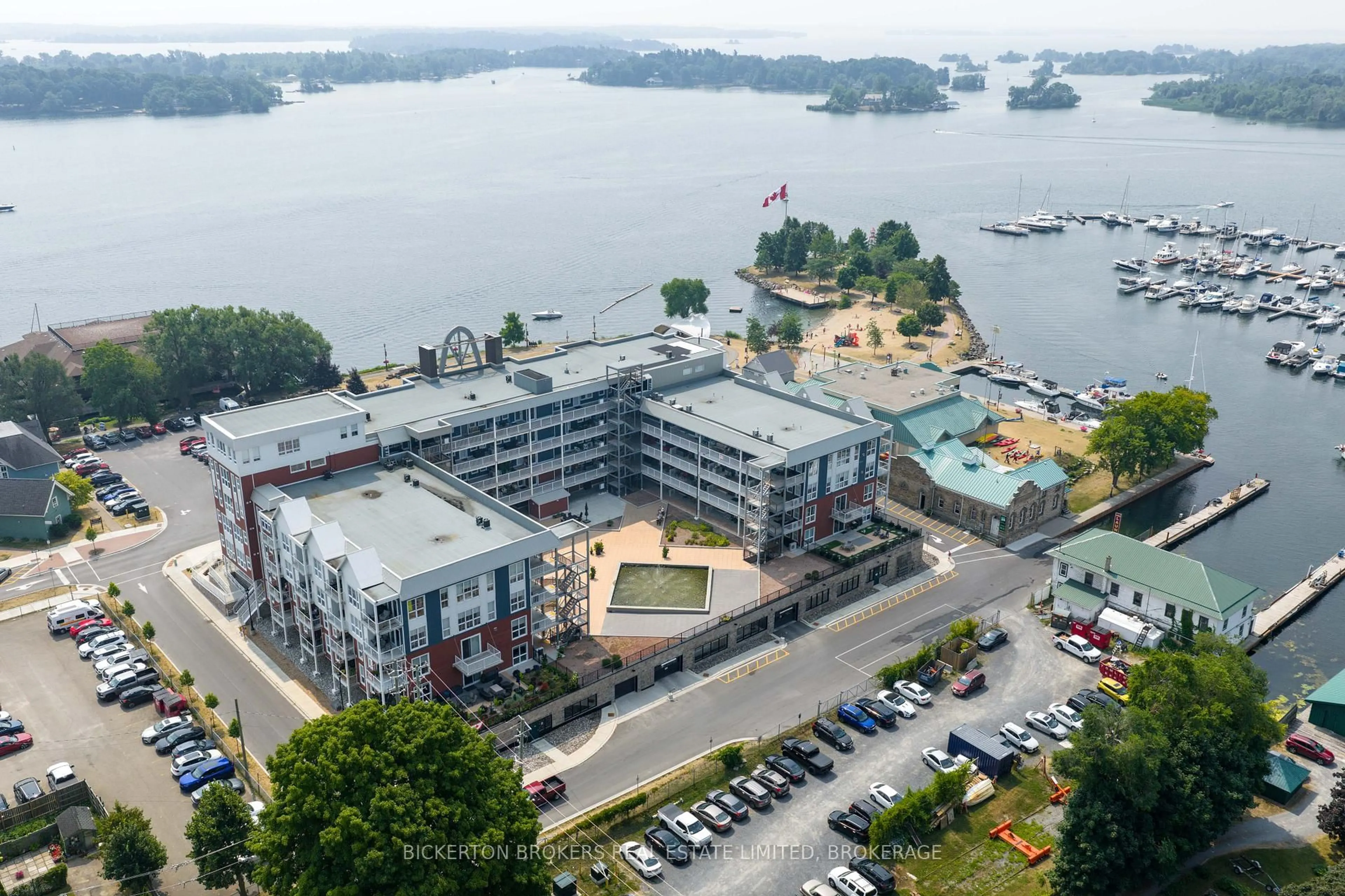 A pic from outside/outdoor area/front of a property/back of a property/a pic from drone, water/lake/river/ocean view for 130 Water St #406, Gananoque Ontario K7G 0A8