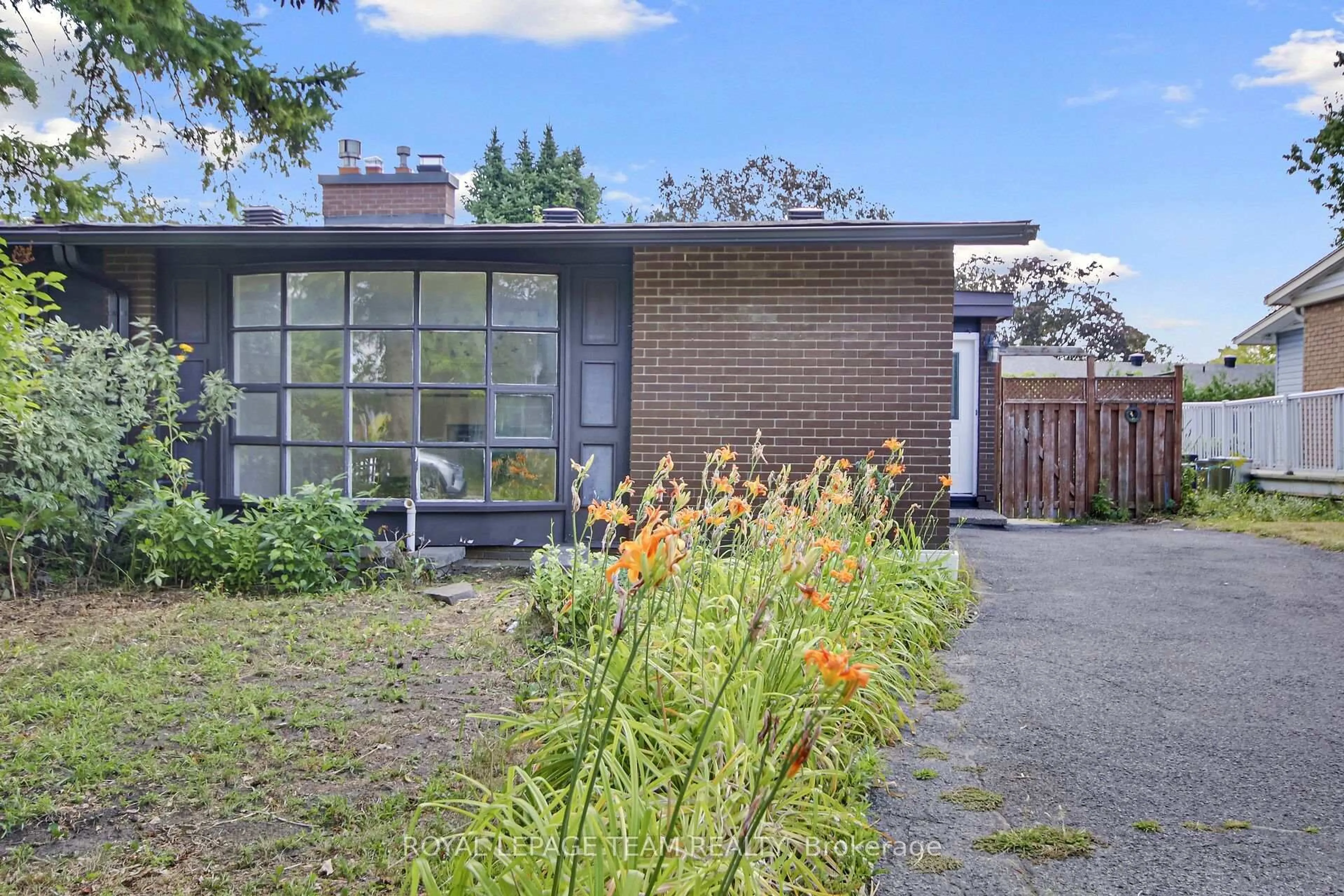 Home with brick exterior material, street for 52 Bowhill Ave, Ottawa Ontario K2E 6S7