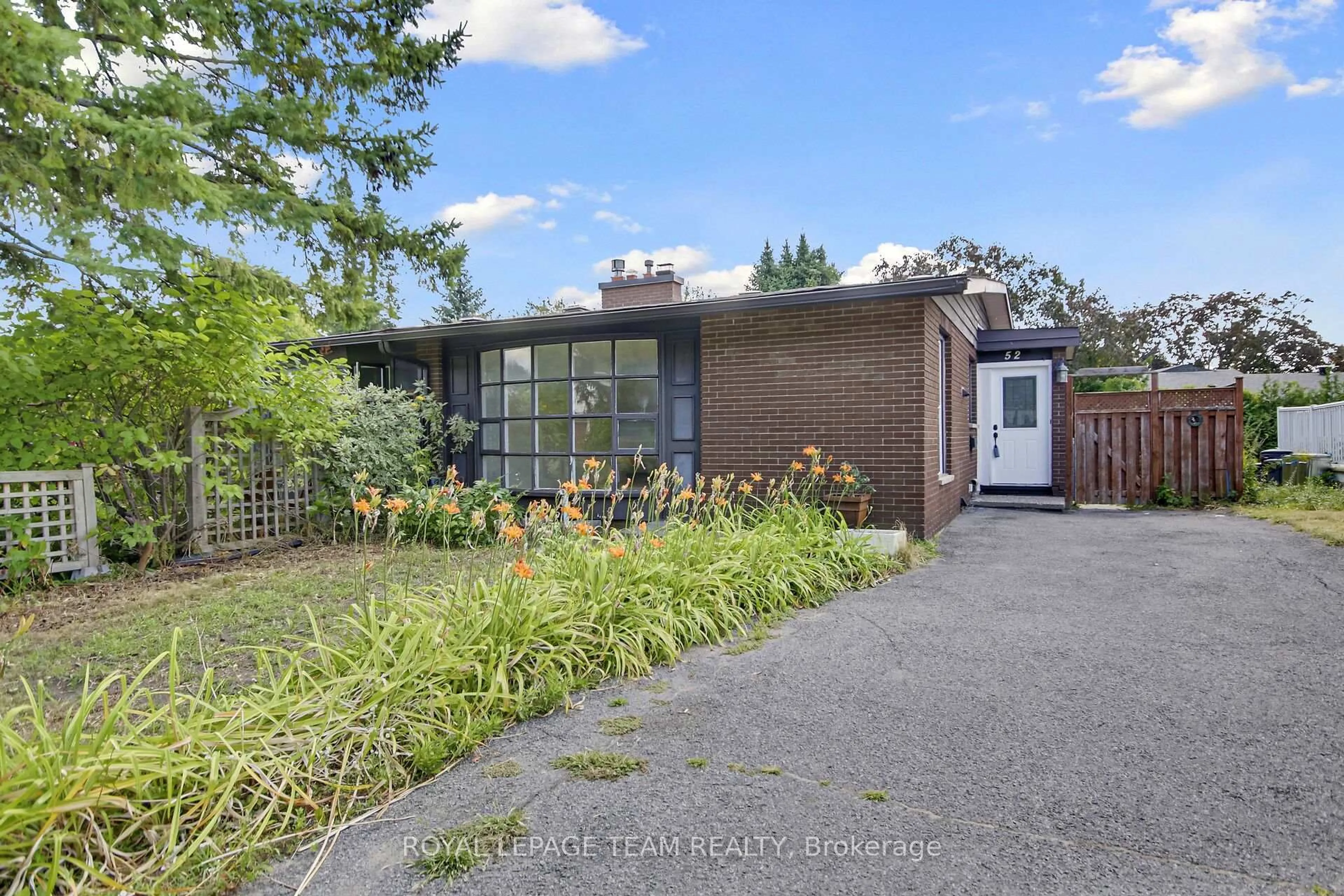 A pic from outside/outdoor area/front of a property/back of a property/a pic from drone, street for 52 Bowhill Ave, Ottawa Ontario K2E 6S7