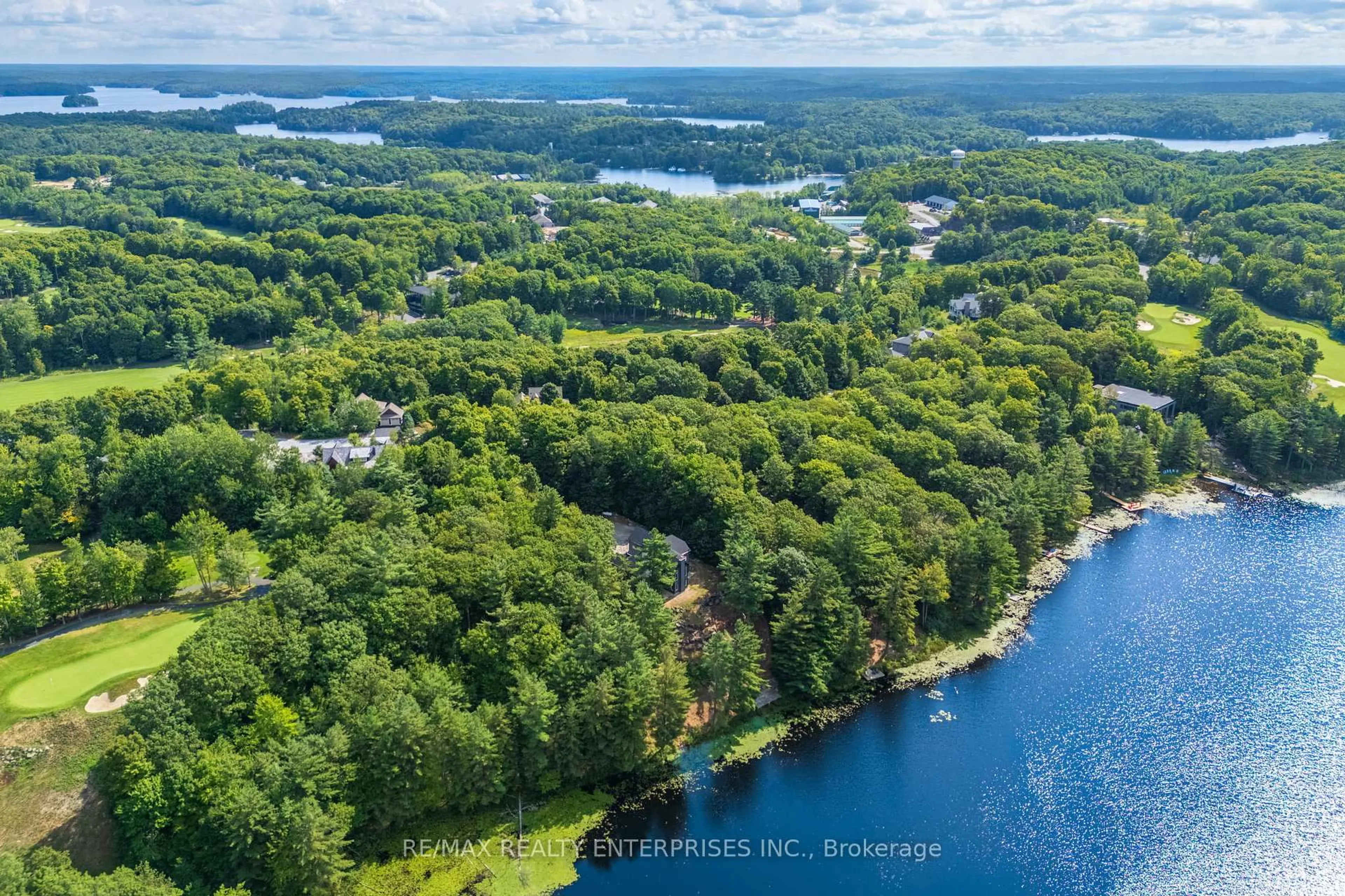 A pic from outside/outdoor area/front of a property/back of a property/a pic from drone, water/lake/river/ocean view for 49 Estates Dr, Muskoka Lakes Ontario P0B 1J0