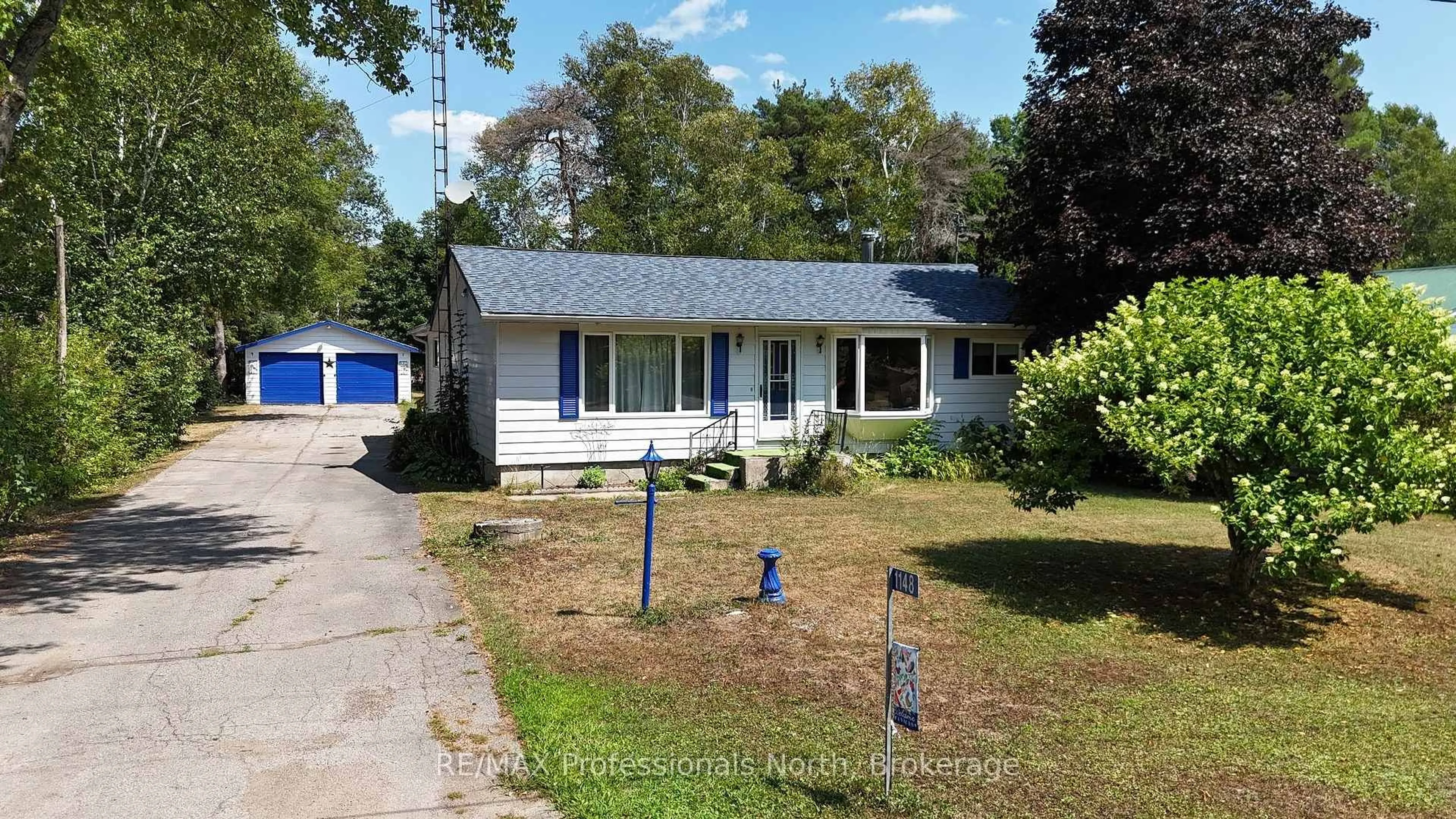 Home with vinyl exterior material, street for 1148 Dark Lake Rd, Wilberforce, ON Rd, Highlands East Ontario K0L 3C0