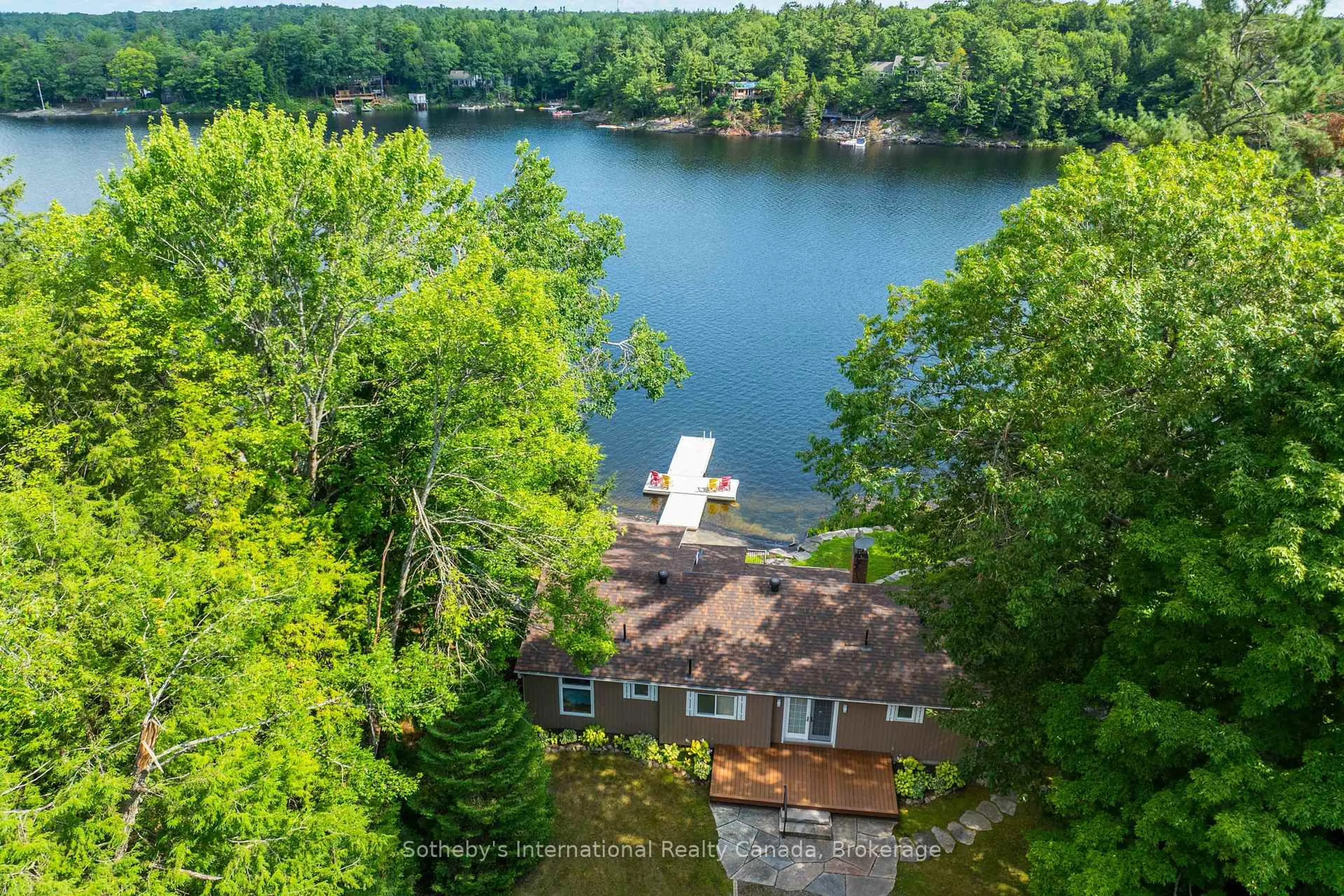 A pic from outside/outdoor area/front of a property/back of a property/a pic from drone, water/lake/river/ocean view for 1097 Hurling Point Rd, Muskoka Lakes Ontario P0C 1A0