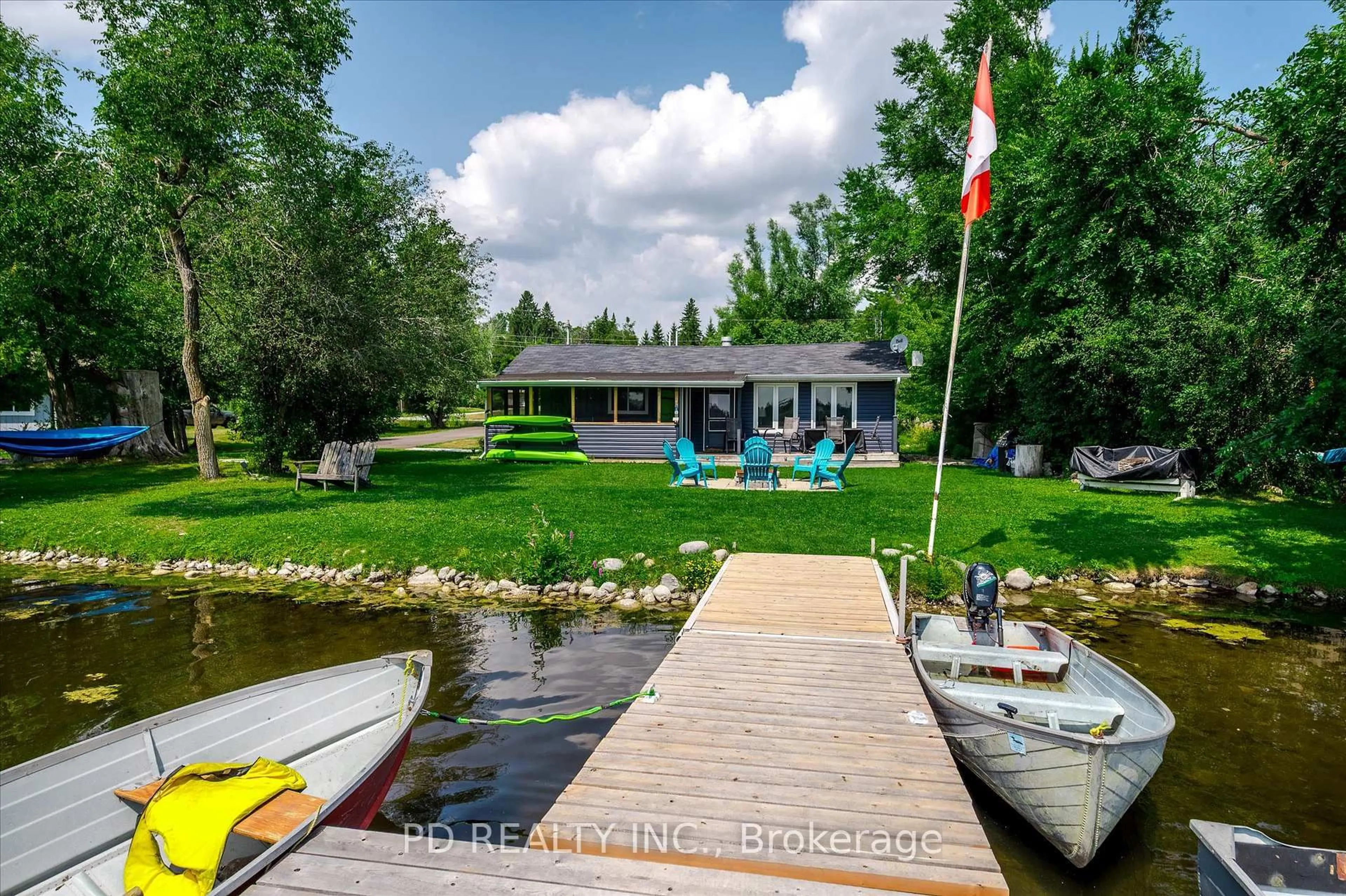 A pic from outside/outdoor area/front of a property/back of a property/a pic from drone, water/lake/river/ocean view for 9 Charlotte Cres, Kawartha Lakes Ontario K0L 2W0