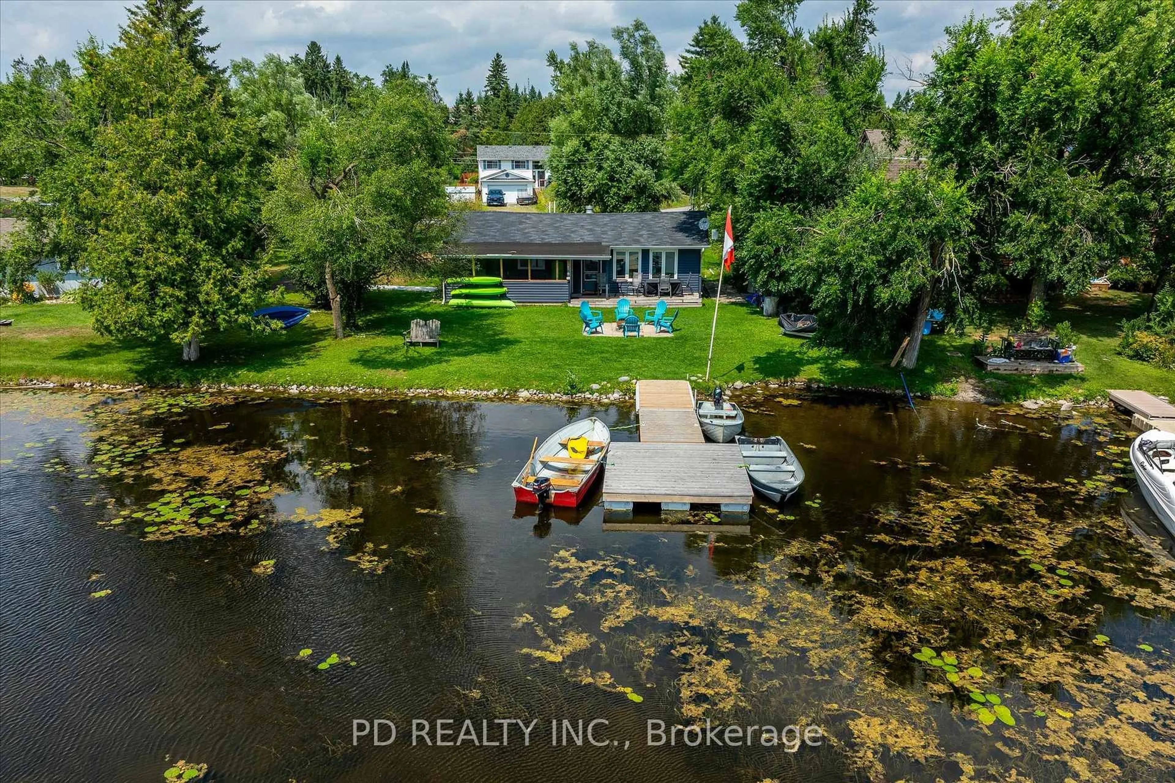 A pic from outside/outdoor area/front of a property/back of a property/a pic from drone, water/lake/river/ocean view for 9 Charlotte Cres, Kawartha Lakes Ontario K0L 2W0
