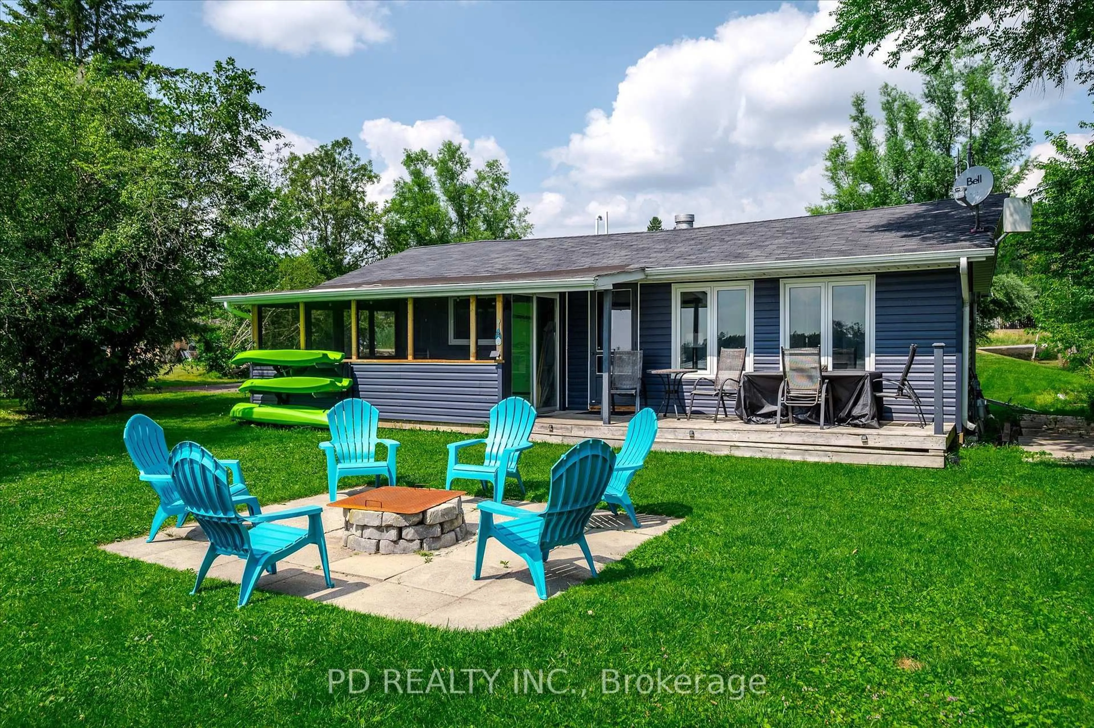A pic from outside/outdoor area/front of a property/back of a property/a pic from drone, water/lake/river/ocean view for 9 Charlotte Cres, Kawartha Lakes Ontario K0L 2W0