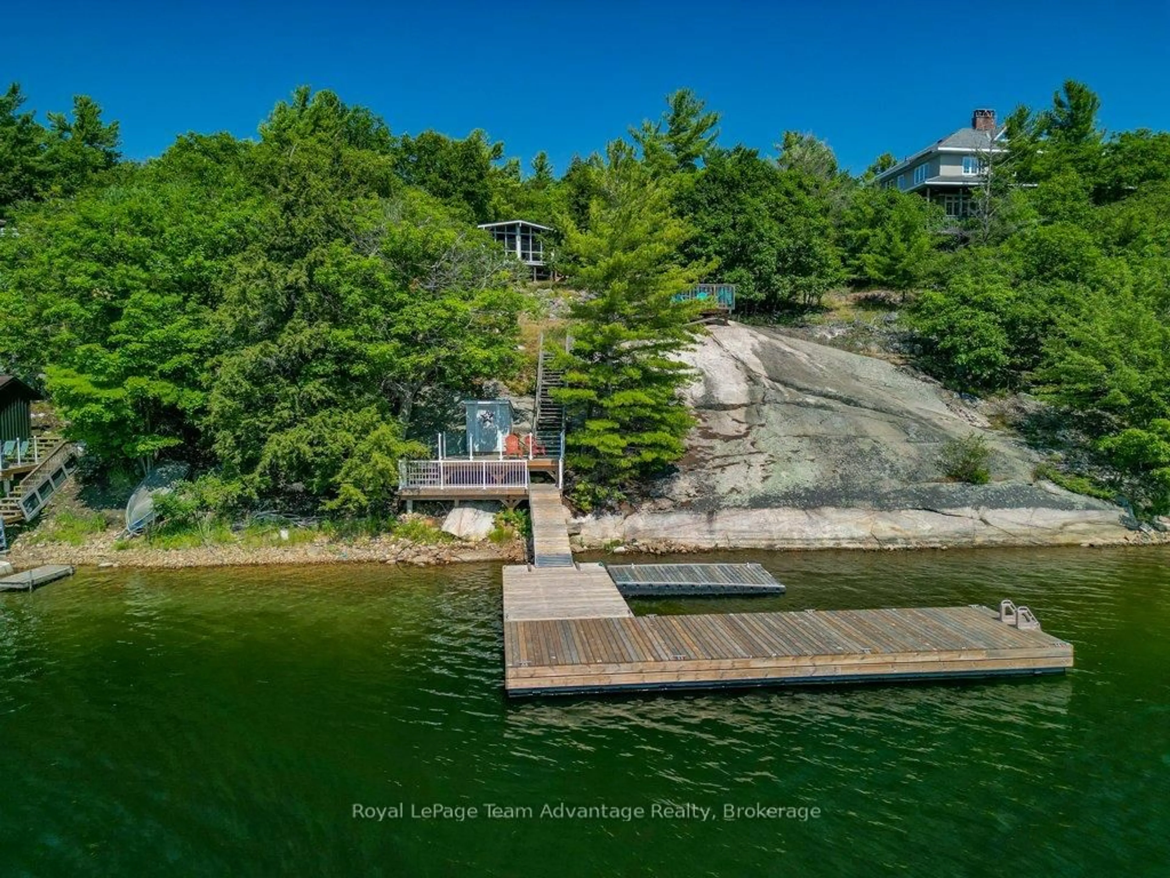 A pic from outside/outdoor area/front of a property/back of a property/a pic from drone, water/lake/river/ocean view for 30 ROCKCLIFFE Dr, Carling Ontario P0G 1G0