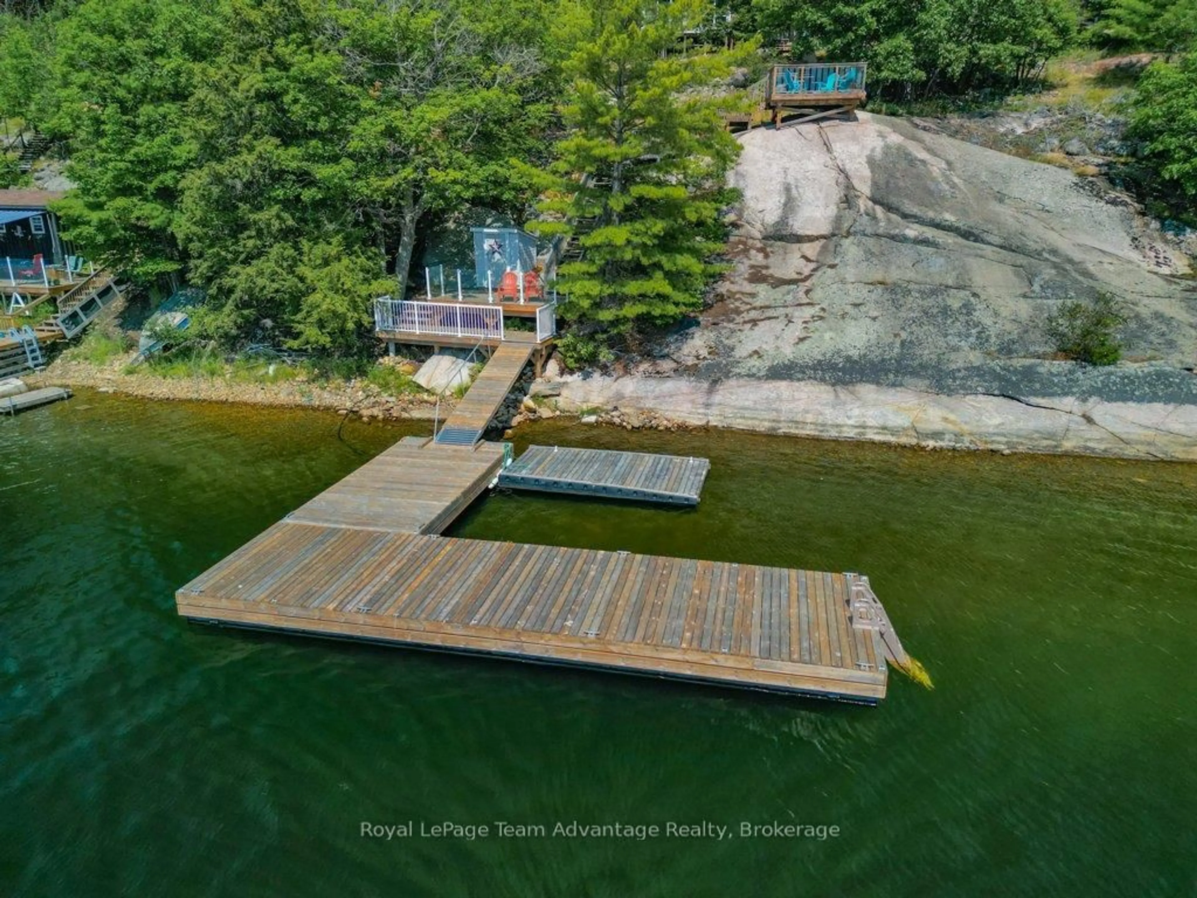 A pic from outside/outdoor area/front of a property/back of a property/a pic from drone, water/lake/river/ocean view for 30 ROCKCLIFFE Dr, Carling Ontario P0G 1G0