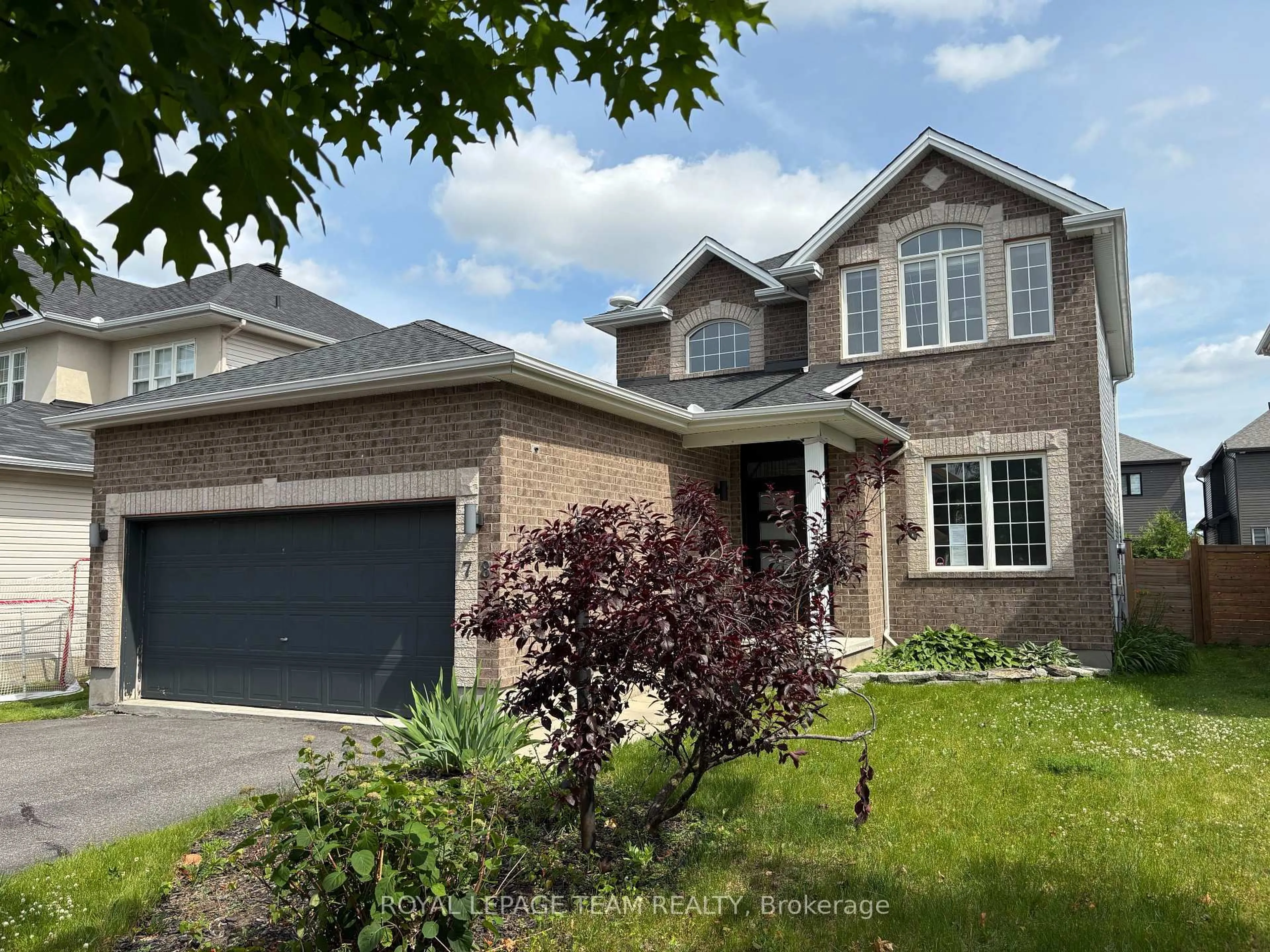Home with brick exterior material, street for 78 Friendly Cres, Stittsville Ontario K2S 2B5