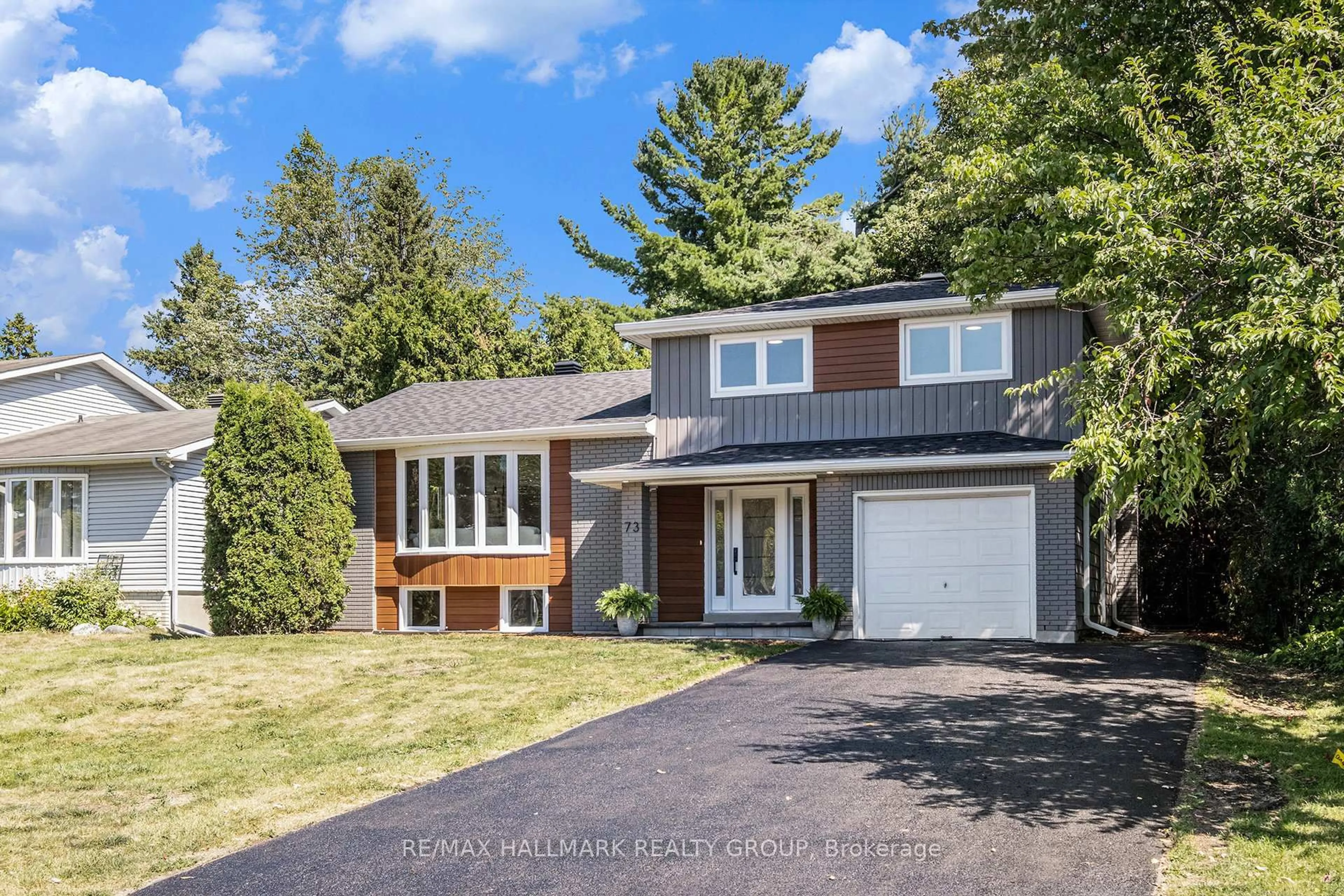 Home with brick exterior material, street for 73 Westpark Dr, Gloucester Ontario K1B 3G4