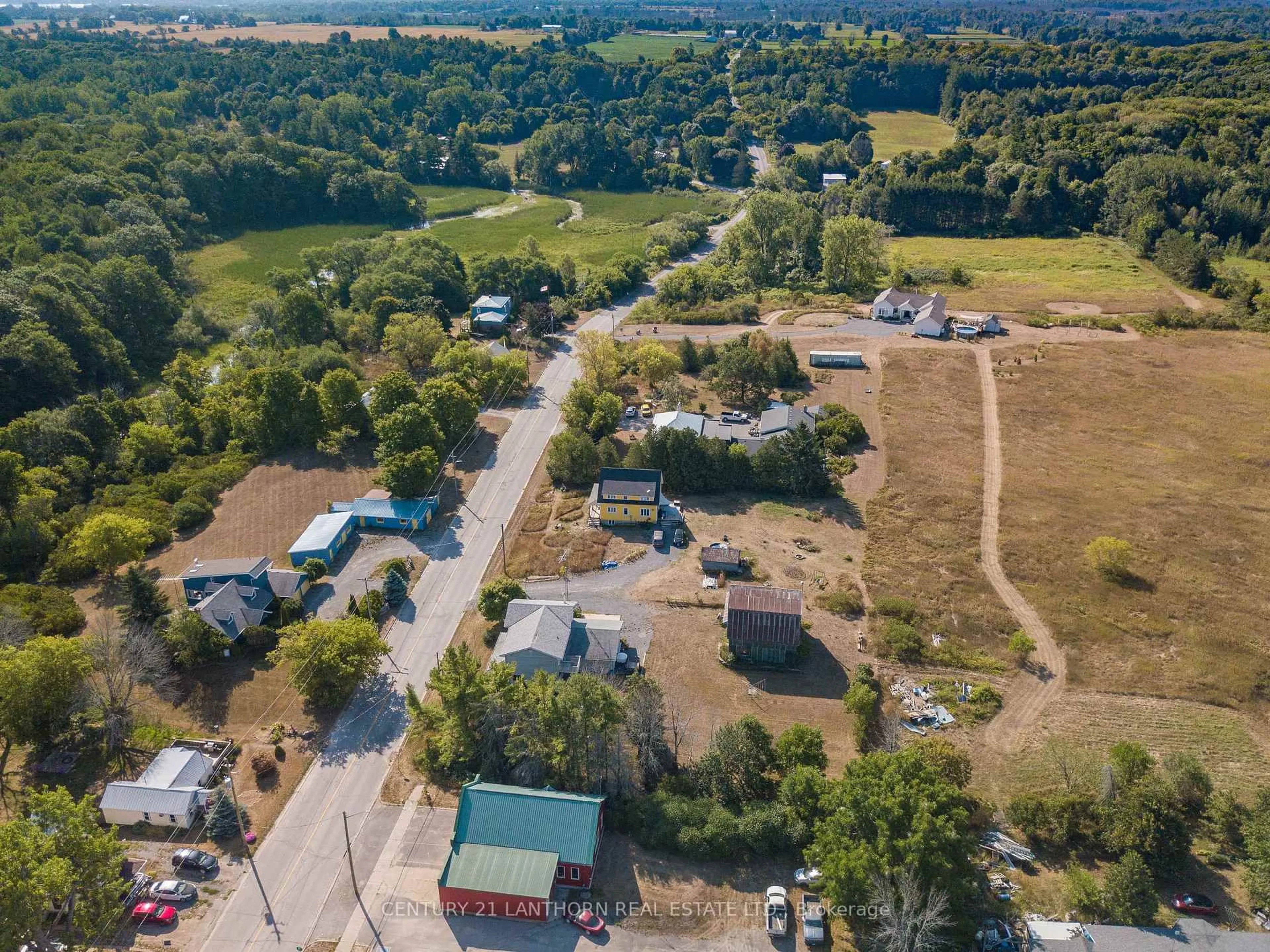 A pic from outside/outdoor area/front of a property/back of a property/a pic from drone, street for 3090 County Rd 10 Rd, Prince Edward County Ontario K0K 2P0