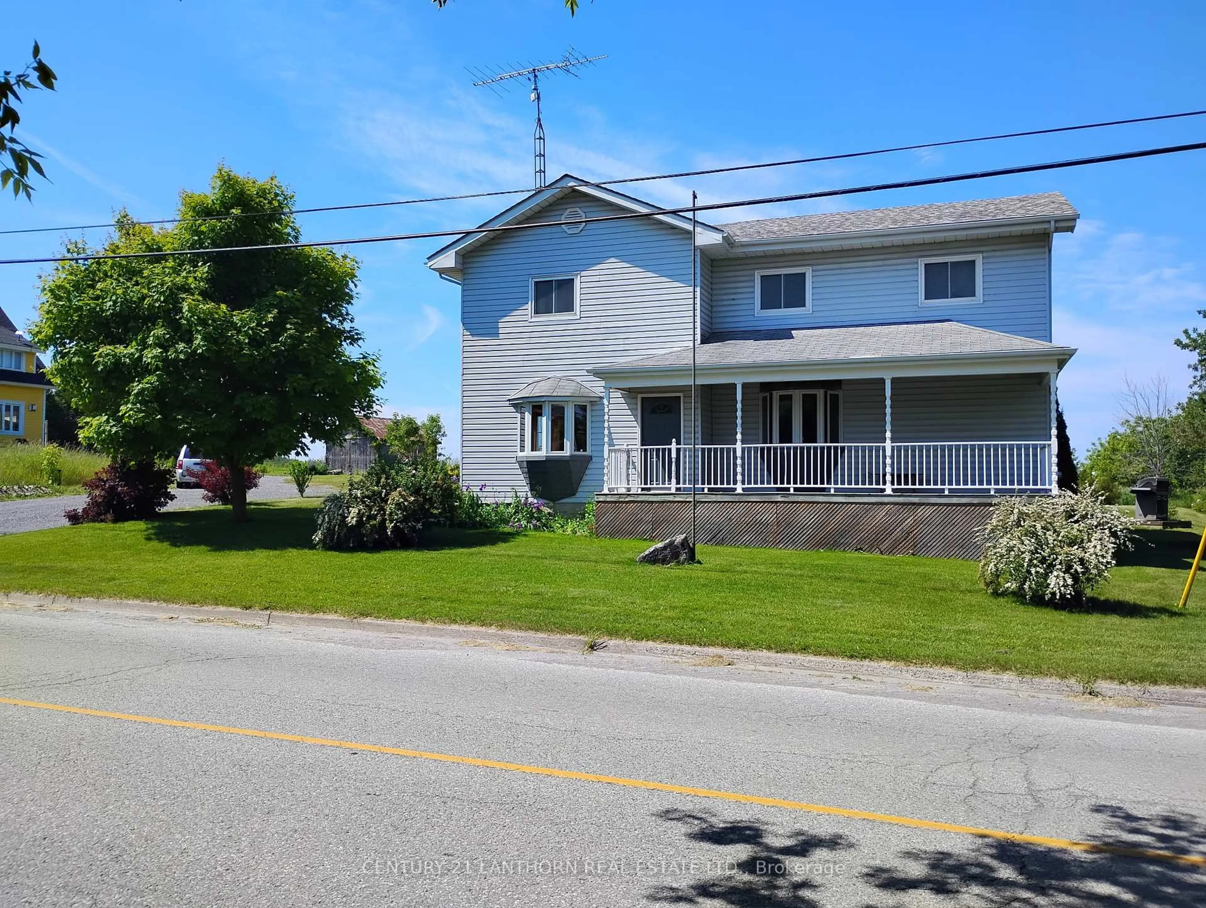 A pic from outside/outdoor area/front of a property/back of a property/a pic from drone, street for 3090 County Rd 10 Rd, Prince Edward County Ontario K0K 2P0