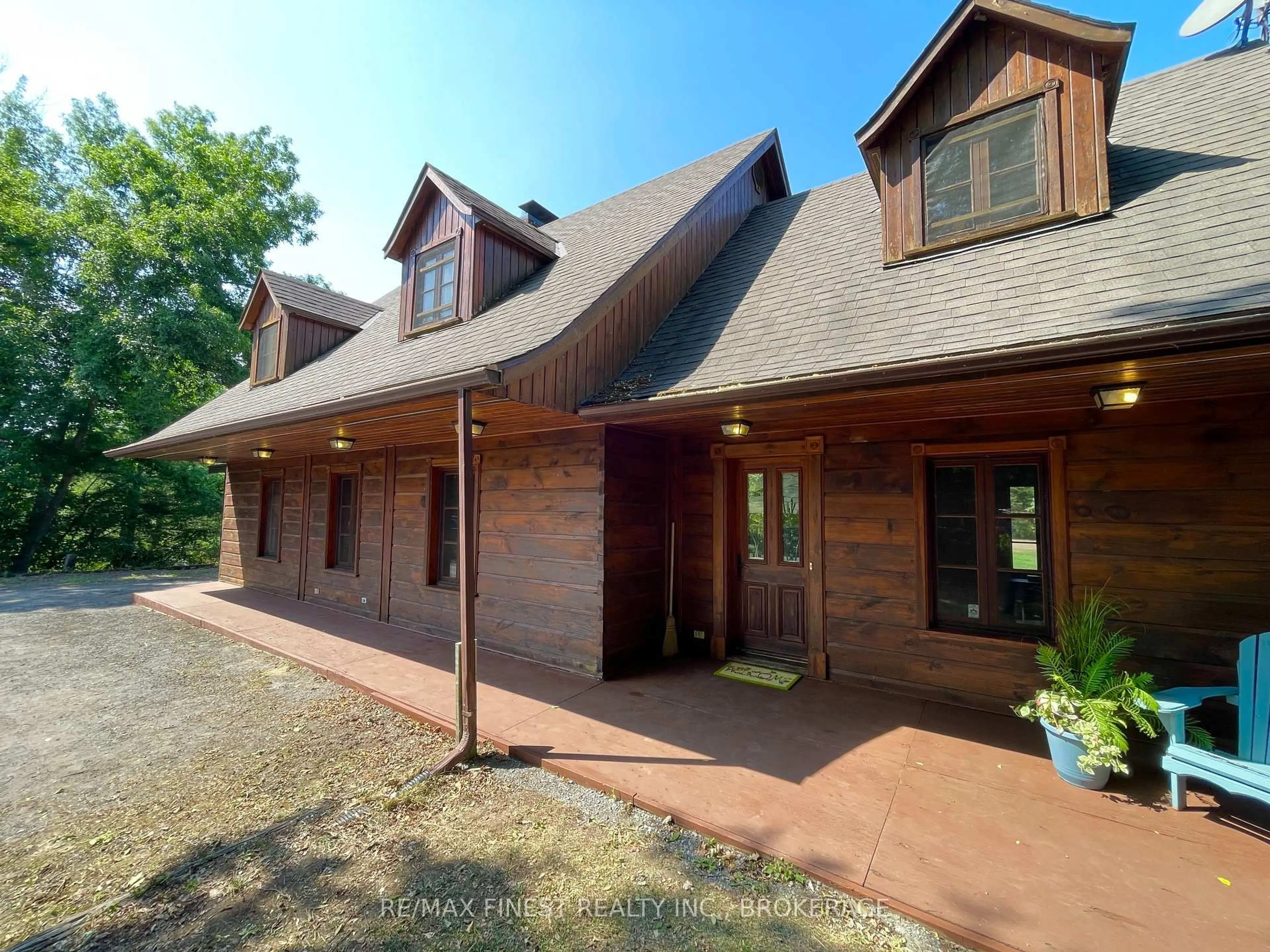 Home with brick exterior material, building for 1132 Leach Lane, Sydenham Ontario K0H 2T0