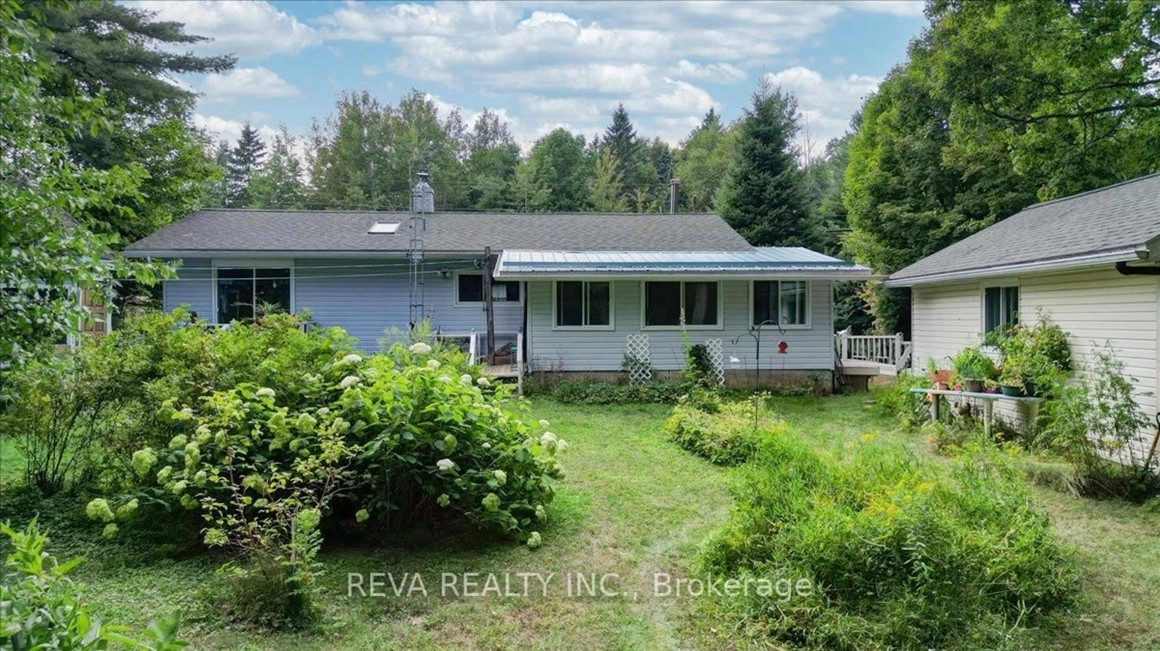 A pic from outside/outdoor area/front of a property/back of a property/a pic from drone, water/lake/river/ocean view for 22069 Highway 41 Highway, Denbigh Ontario K0H 1L0