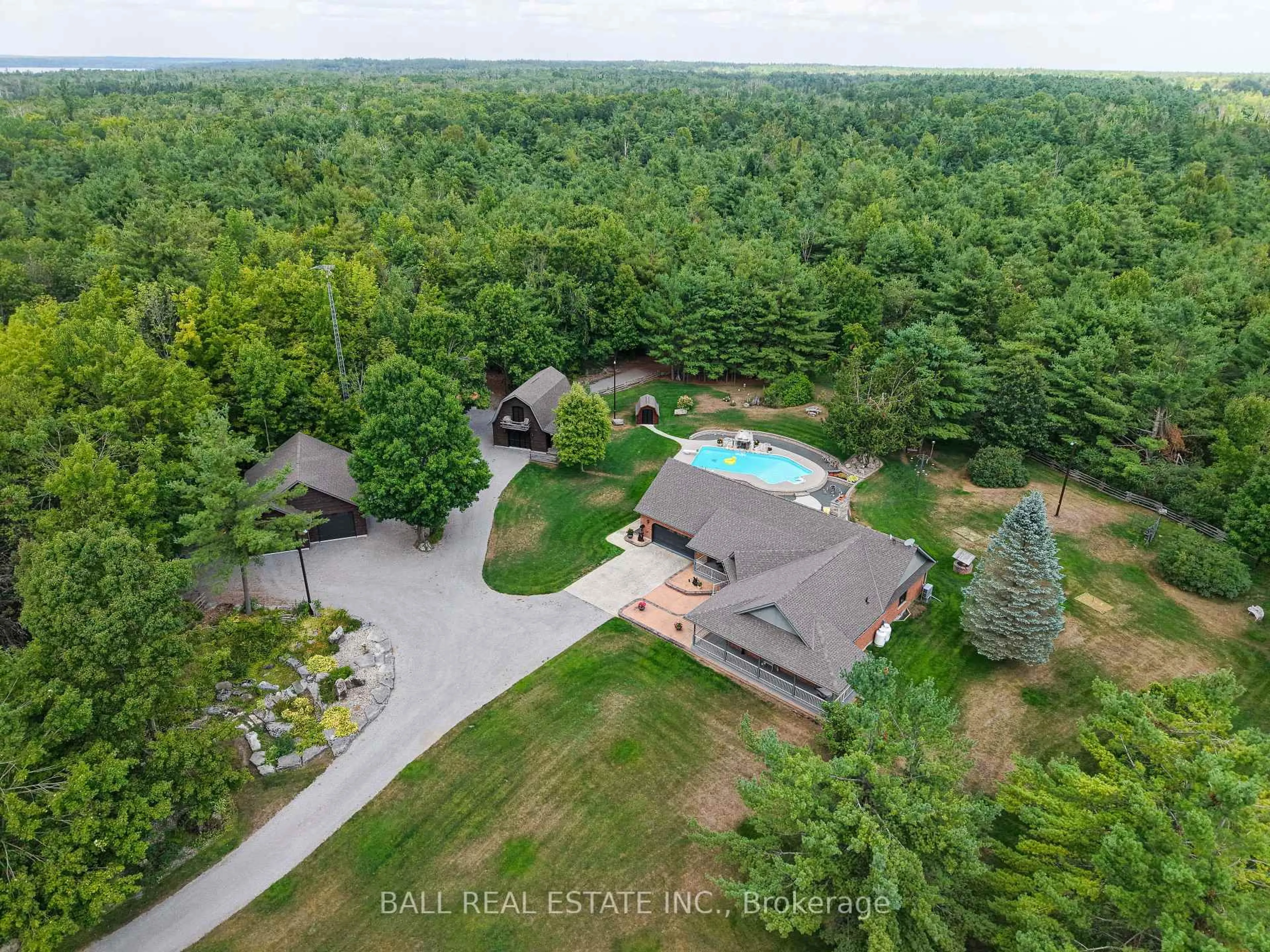 A pic from outside/outdoor area/front of a property/back of a property/a pic from drone, forest/trees view for 110 Grantsville Tr, Trent Lakes Ontario K0L 1J0