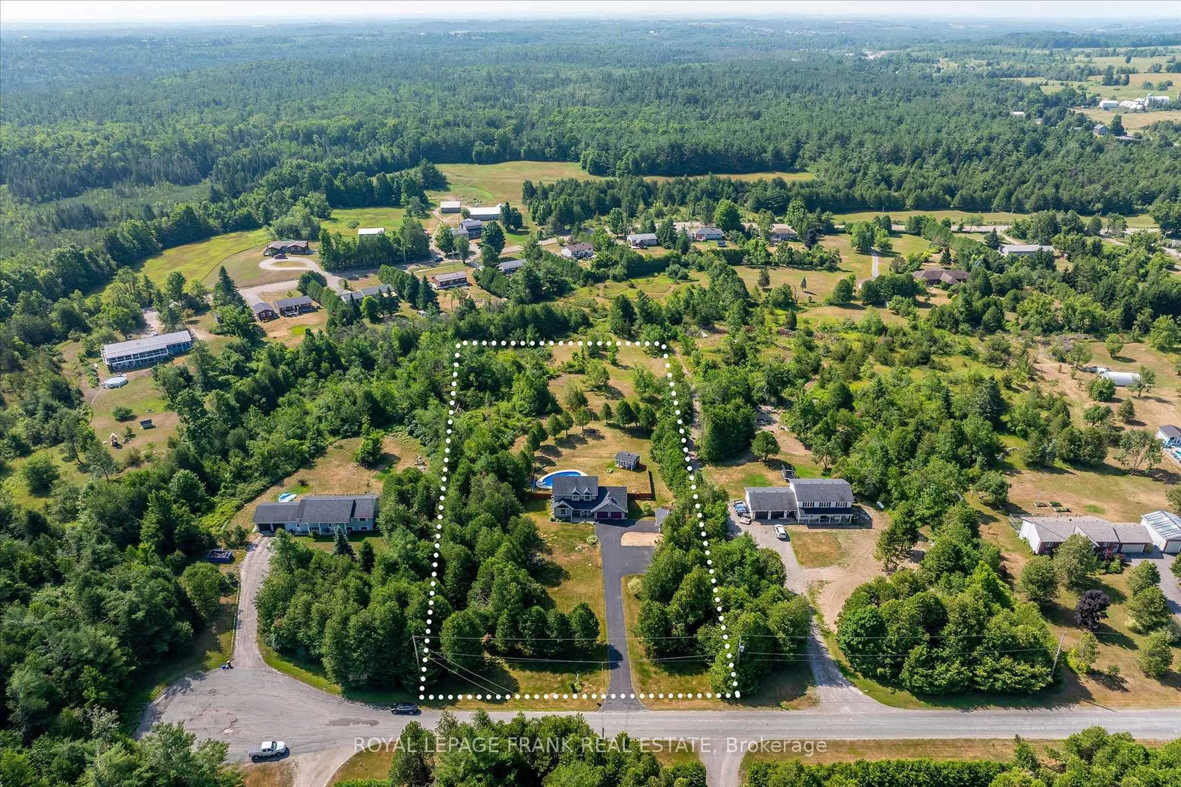 A pic from outside/outdoor area/front of a property/back of a property/a pic from drone, forest/trees view for 229 Lonsberry Lane, Douro-Dummer Ontario K0L 3A0