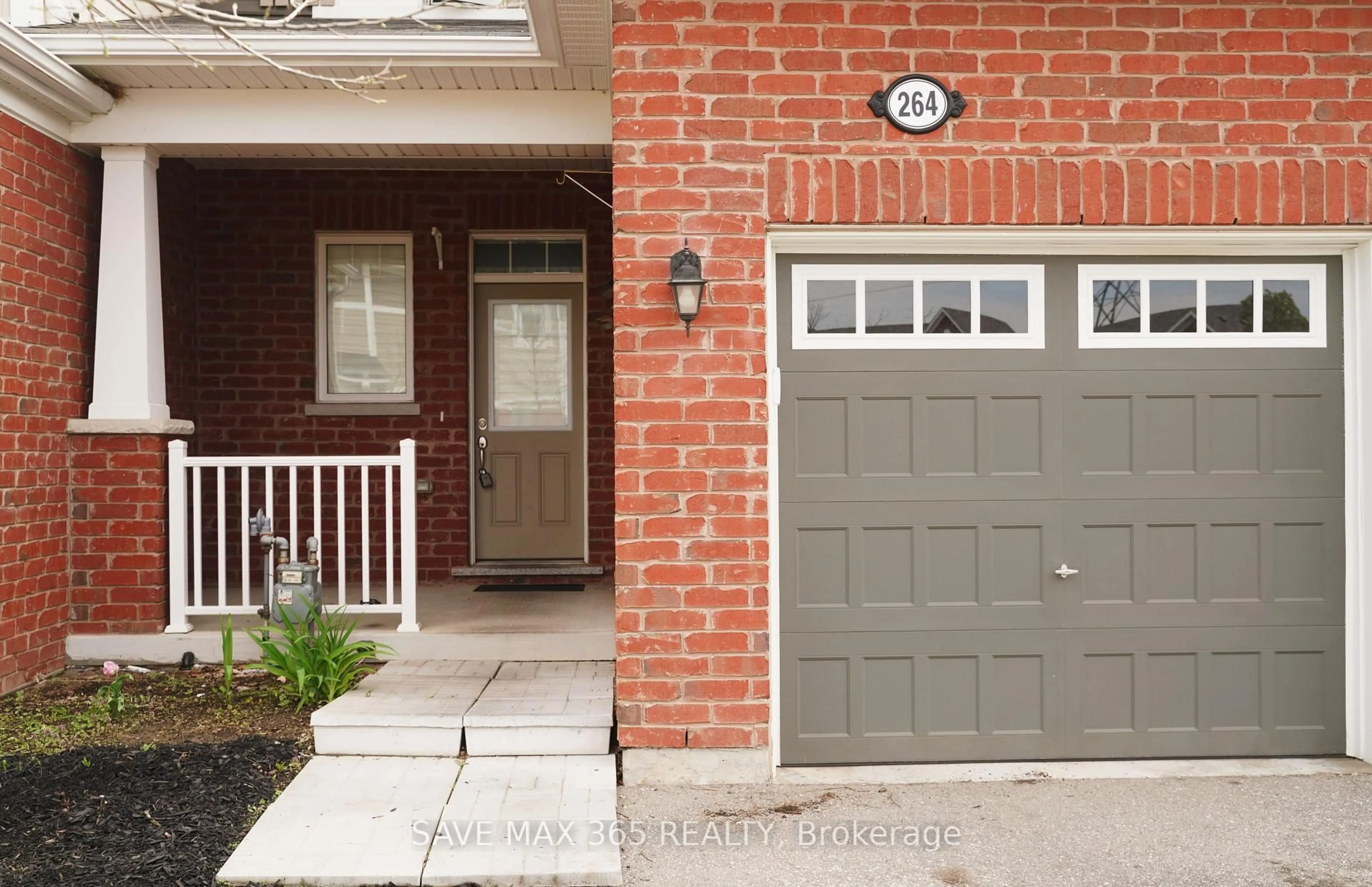 Home with brick exterior material, street for 264 Waterbrook Lane, Kitchener Ontario N2P 0H7