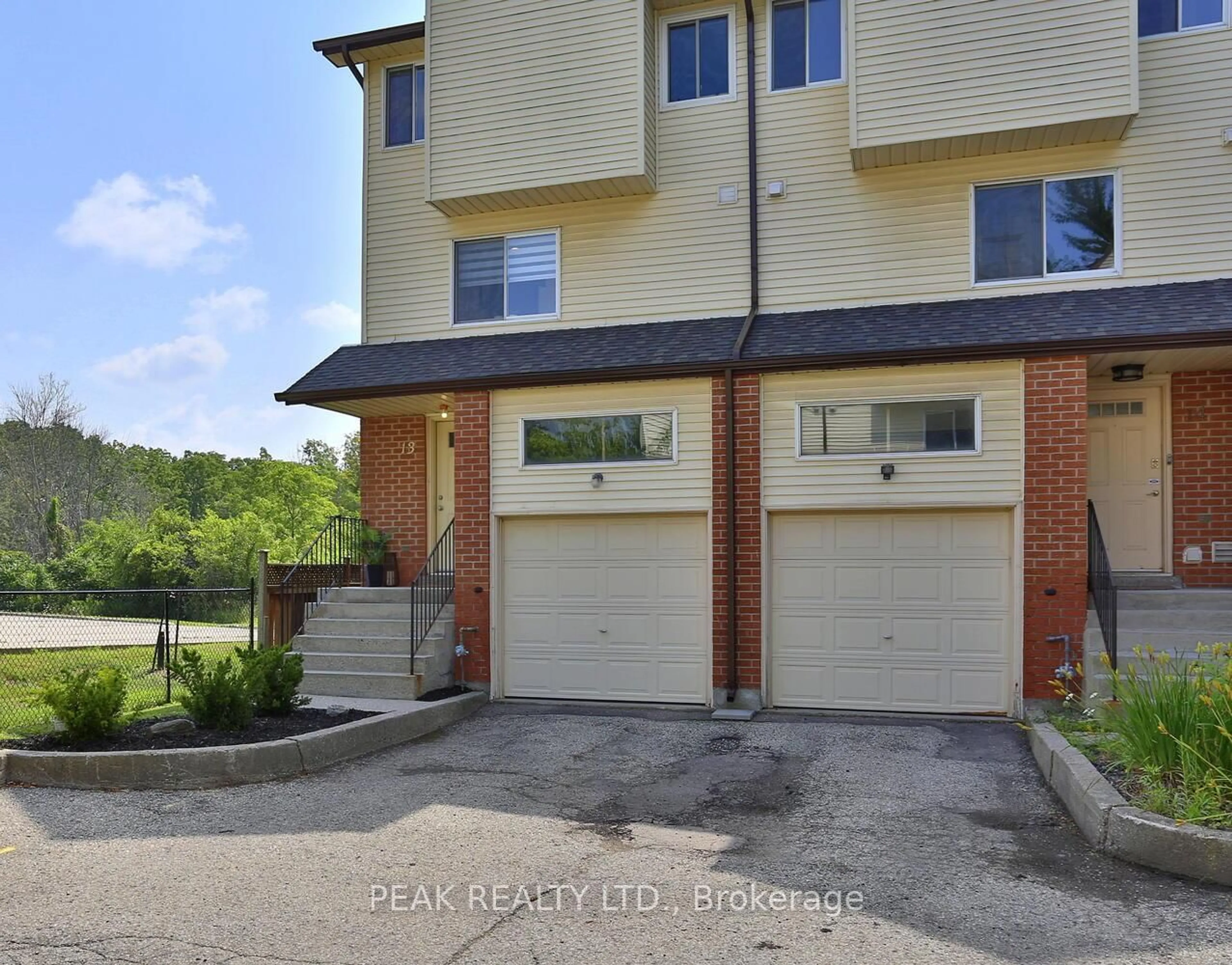 Home with brick exterior material, street for 1085 Queens Blvd, Kitchener Ontario N2M 1B9