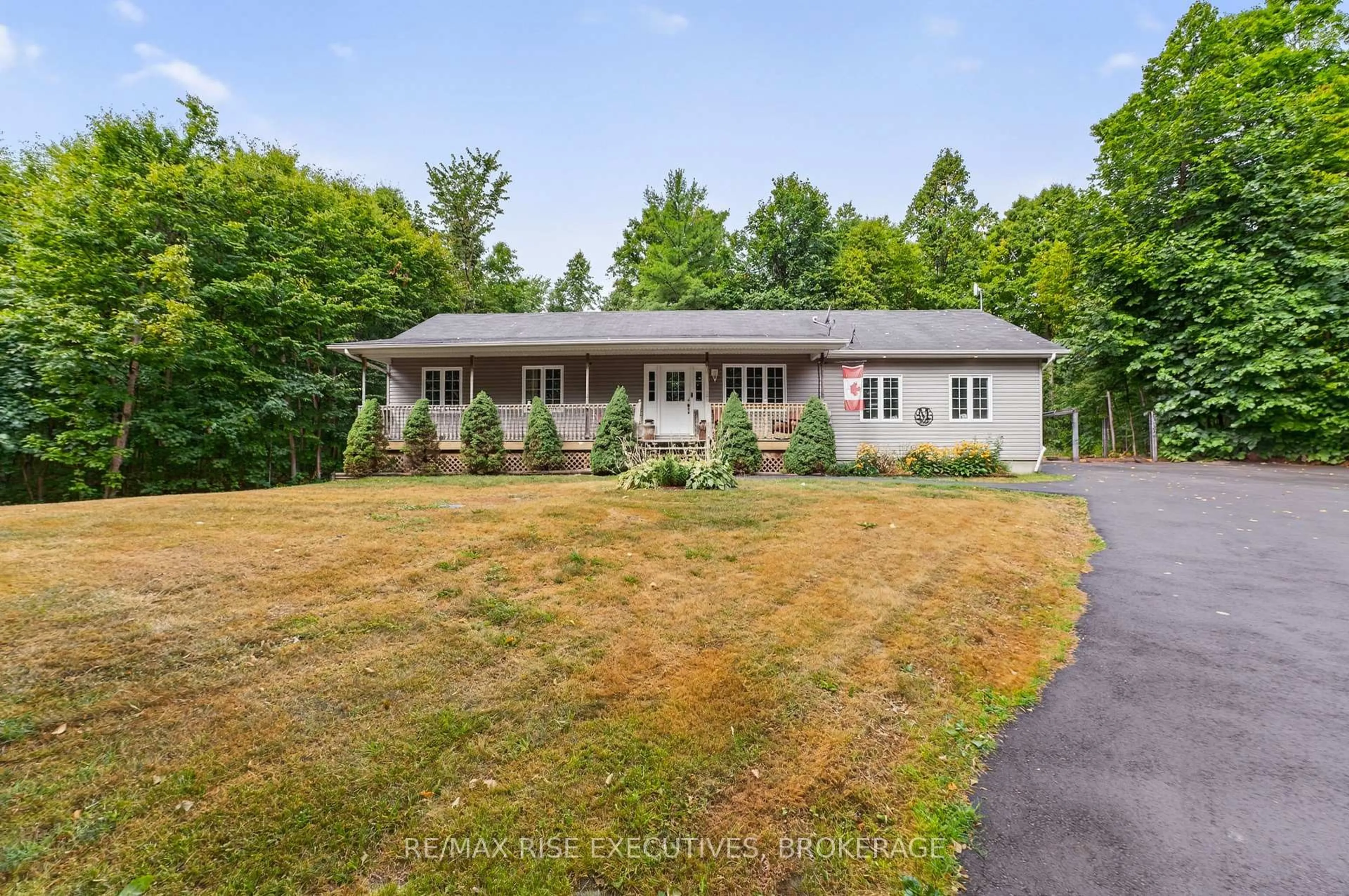 A pic from outside/outdoor area/front of a property/back of a property/a pic from drone, unknown for 4623 Lower Round Lake Rd, Battersea Ontario K0H 1H0