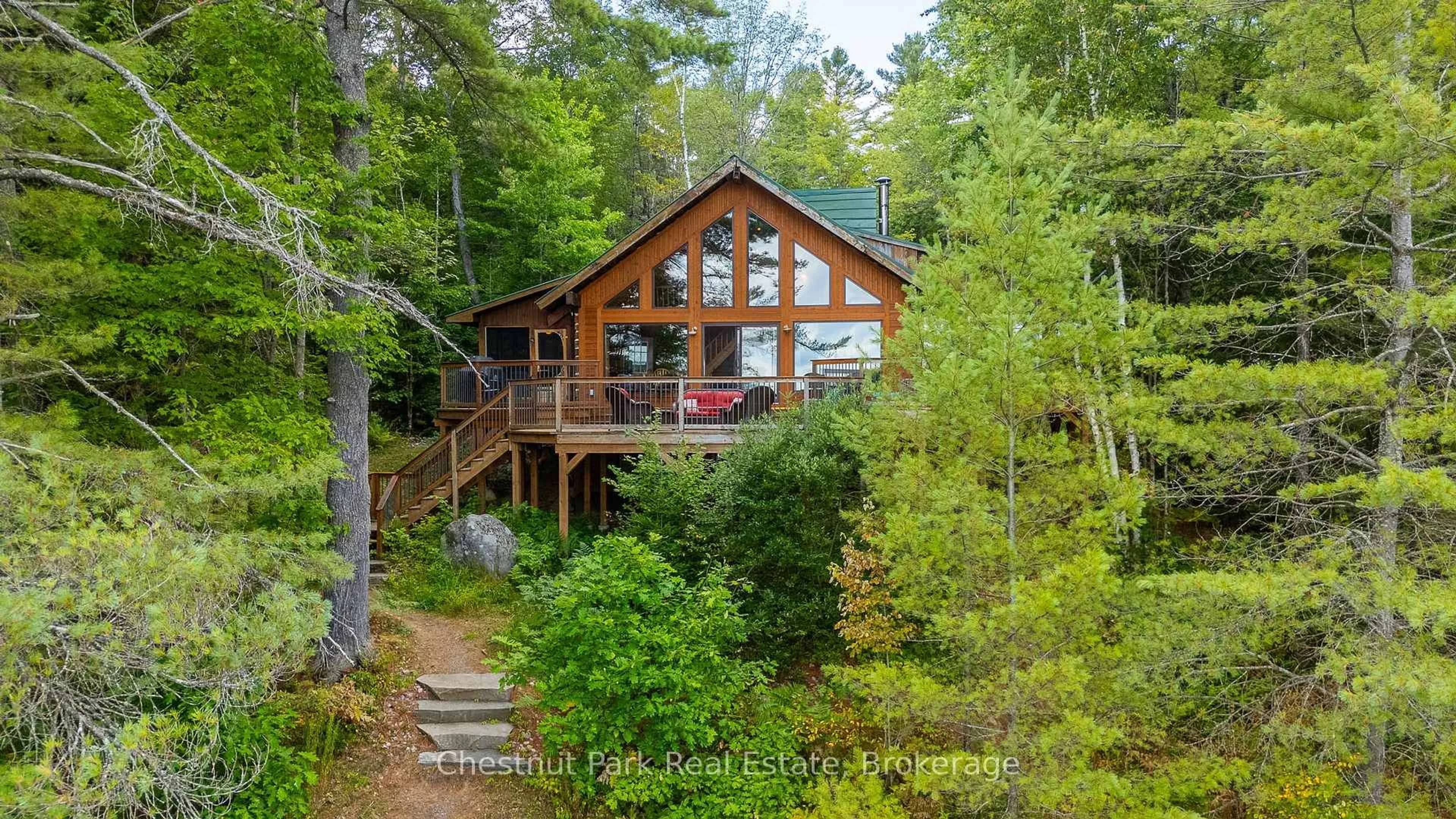 A pic from outside/outdoor area/front of a property/back of a property/a pic from drone, water/lake/river/ocean view for 1199 Camp Wheeler Lane, Algonquin Highlands Ontario K0M 1J2