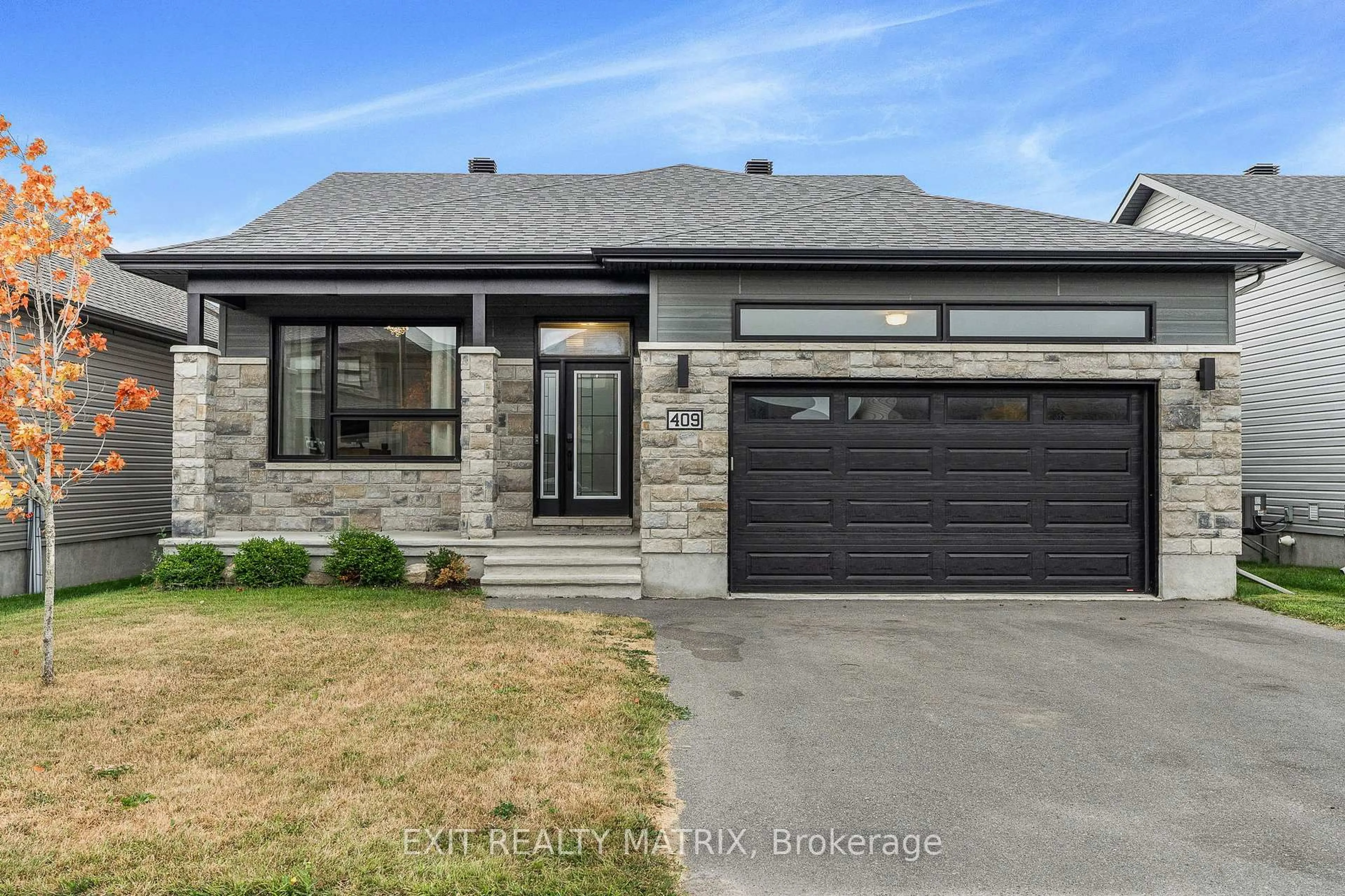 Home with brick exterior material, street for 409 Colmar St, Russell Ontario K0A 1W0
