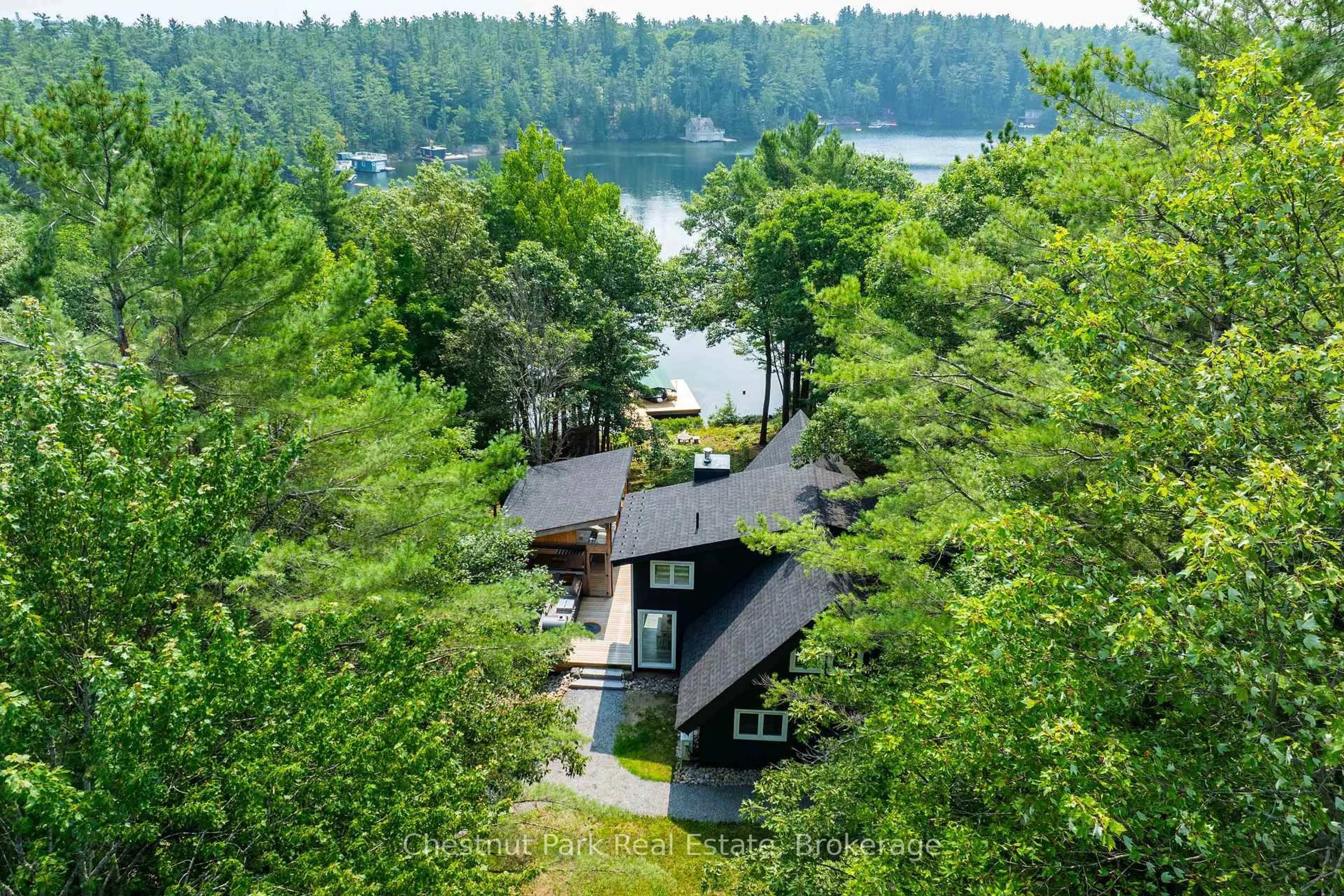 A pic from outside/outdoor area/front of a property/back of a property/a pic from drone, water/lake/river/ocean view for 107 Steeles Rd, Seguin Ontario P0C 1J0