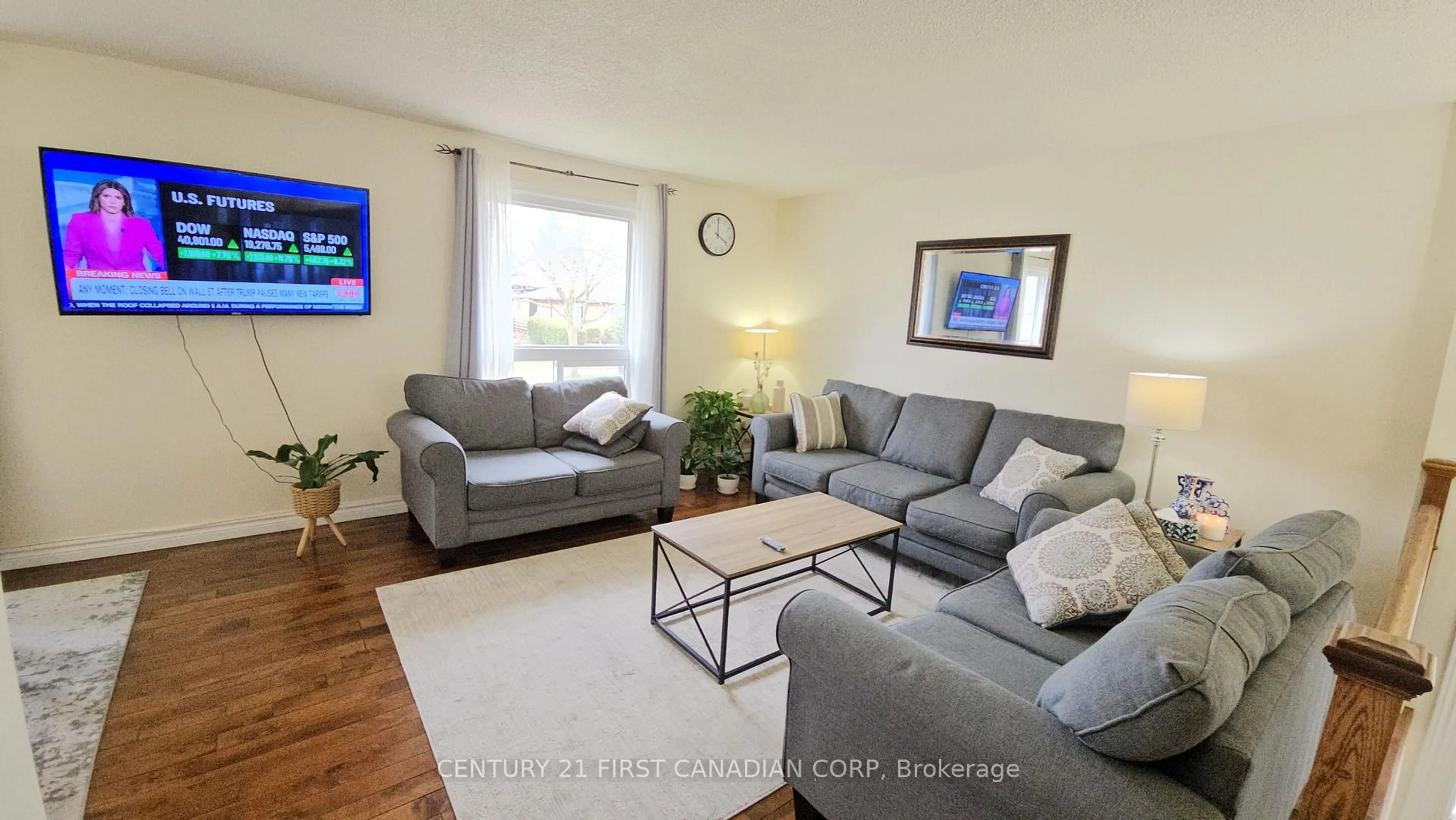 Living room with furniture, wood/laminate floor for 45 Locust Cres, London South Ontario N6E 2K1